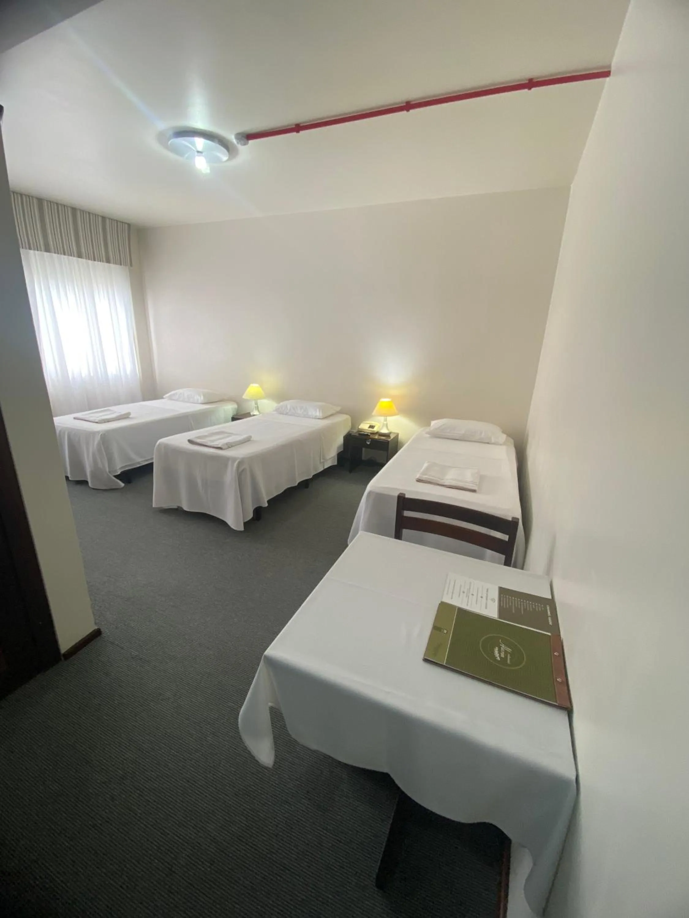 Bed in Planalto Hotel