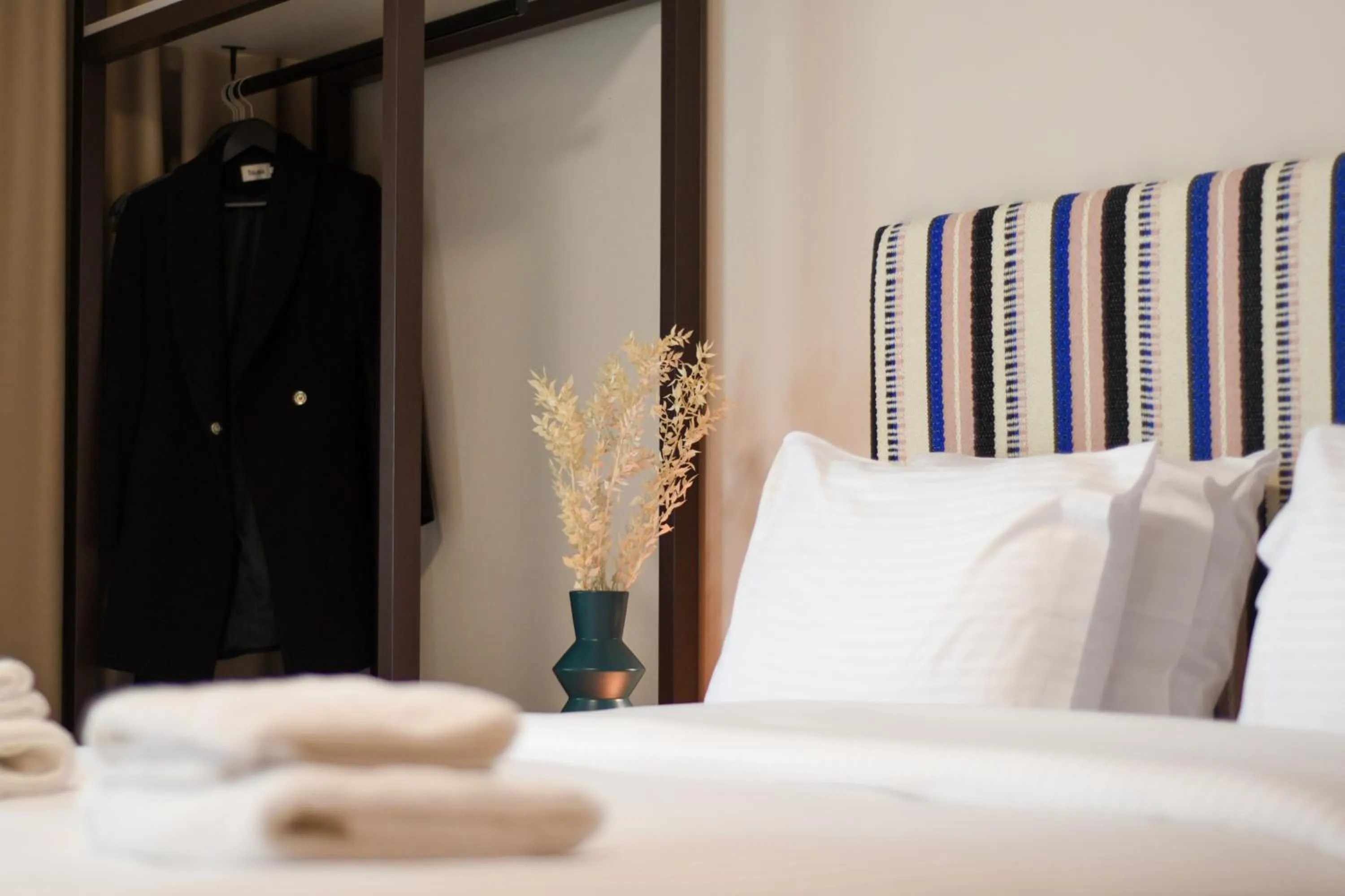 Bed in Pavo Art Hotel