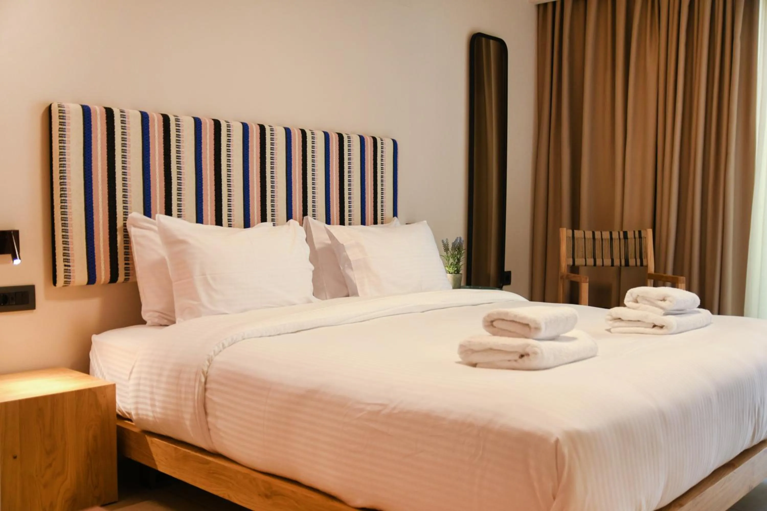 Bed in Pavo Art Hotel