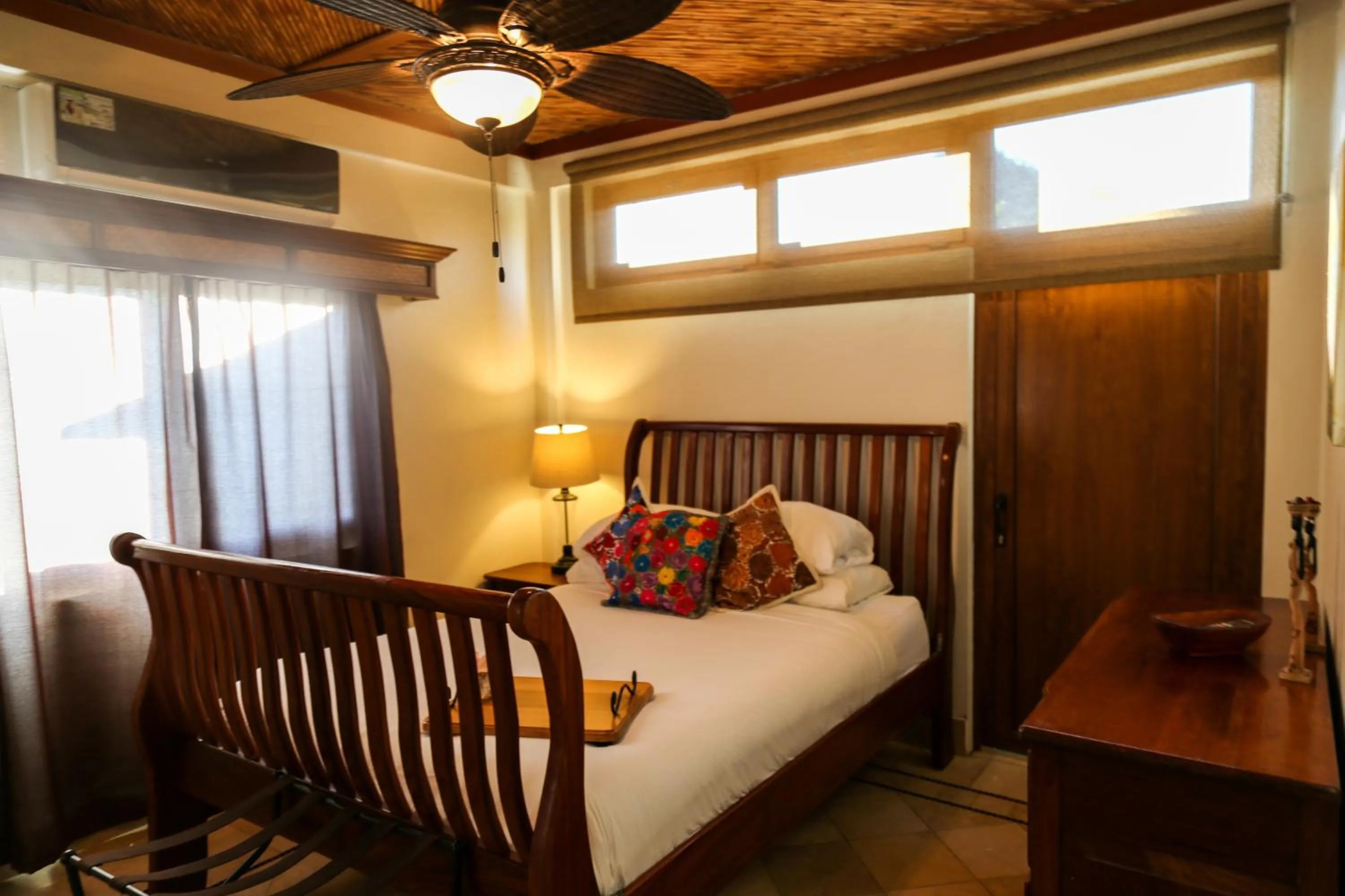 Bed in The Lodge at Jaguar Reef