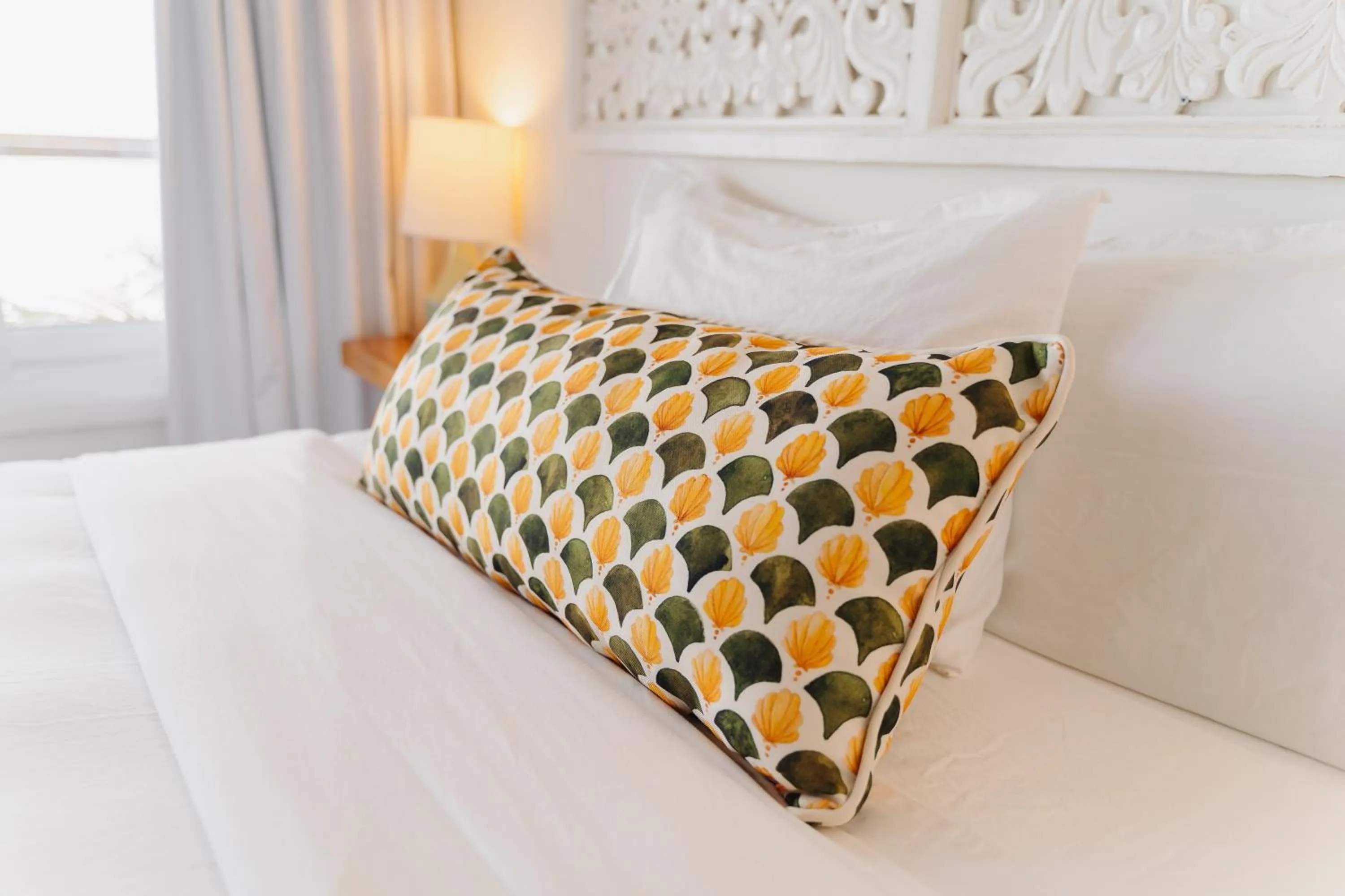 Bed in The Beach House Boutique Hotel