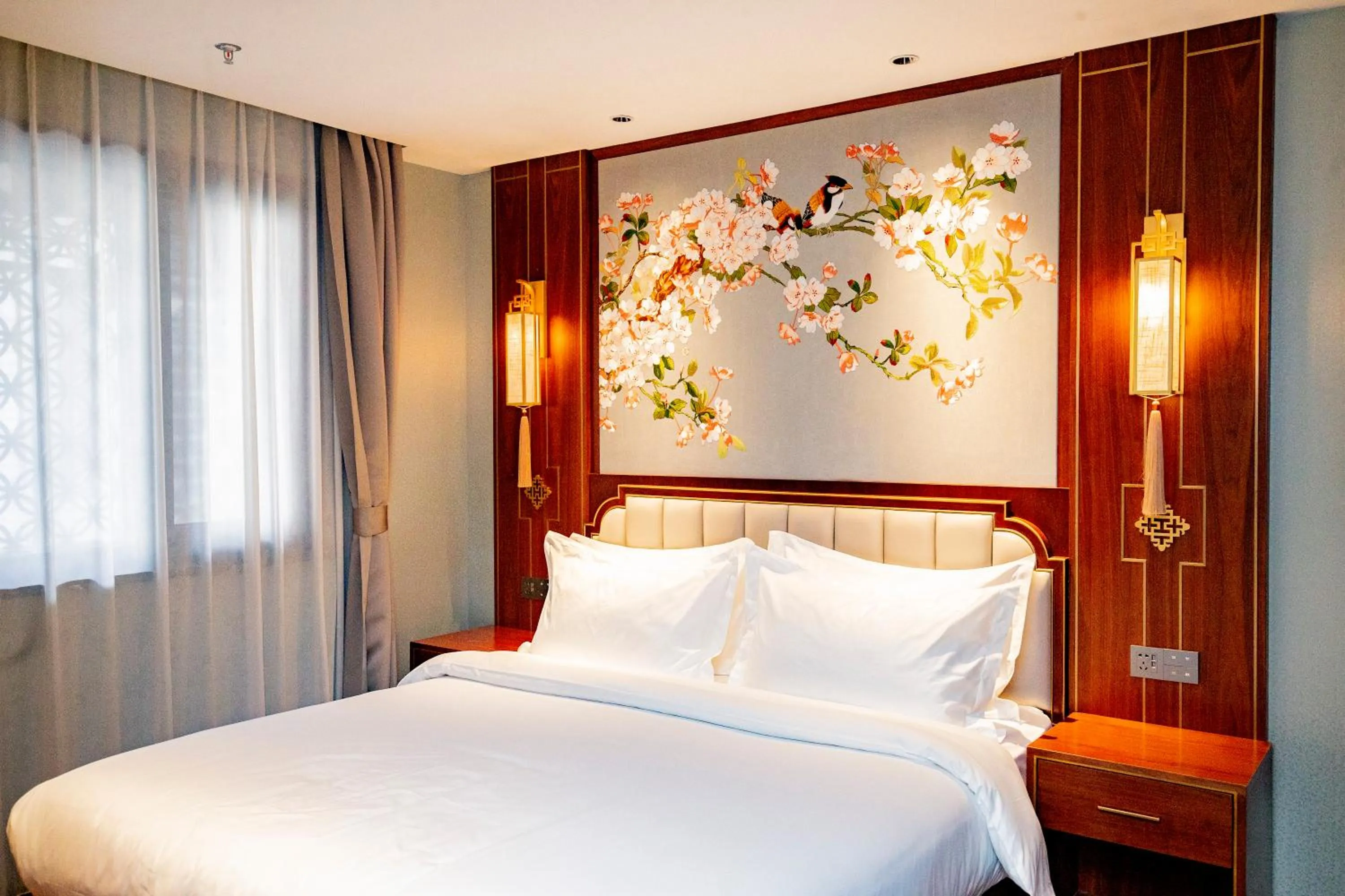 Bed in Pierr Palace Hotel (Beijing Nanluo Guxiang)