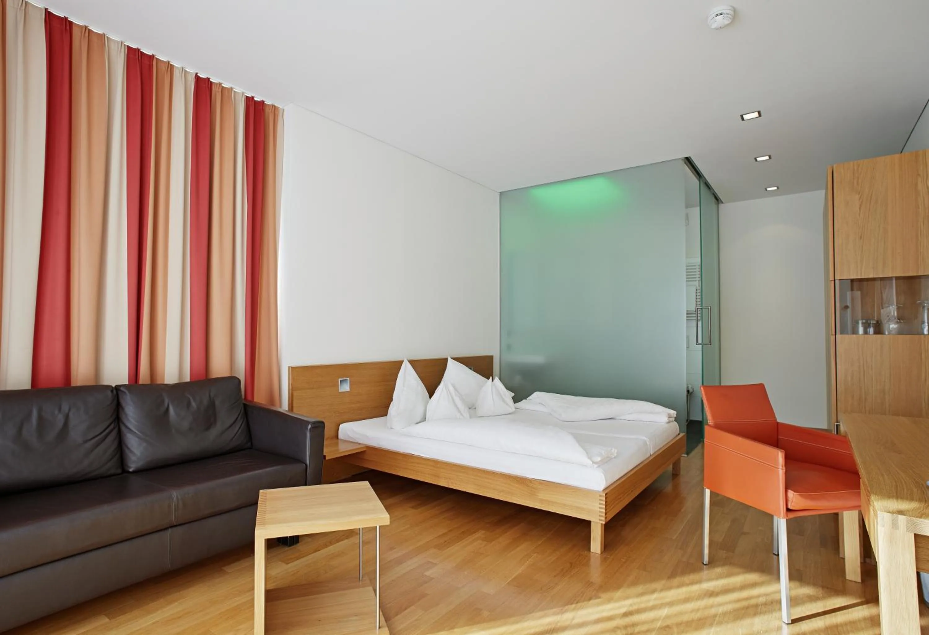 Seating area, Bed in Hotel Krone