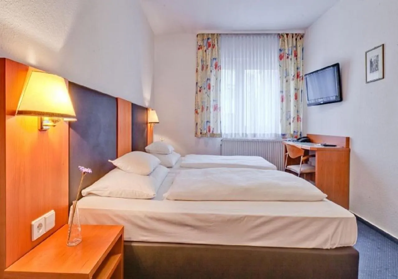 Photo of the whole room, Bed in Hotel am Friedensplatz