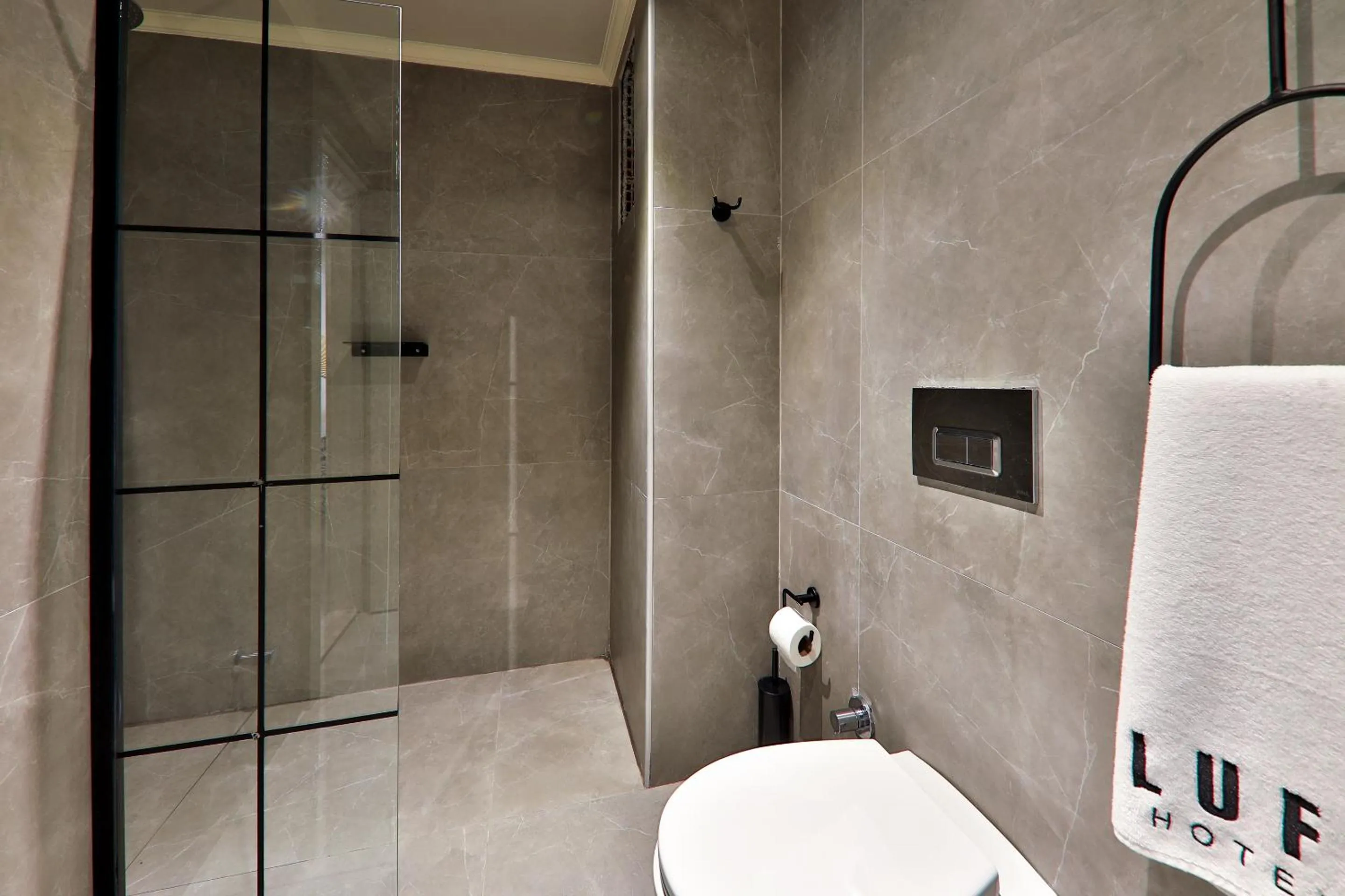 Toilet in Luff Suites