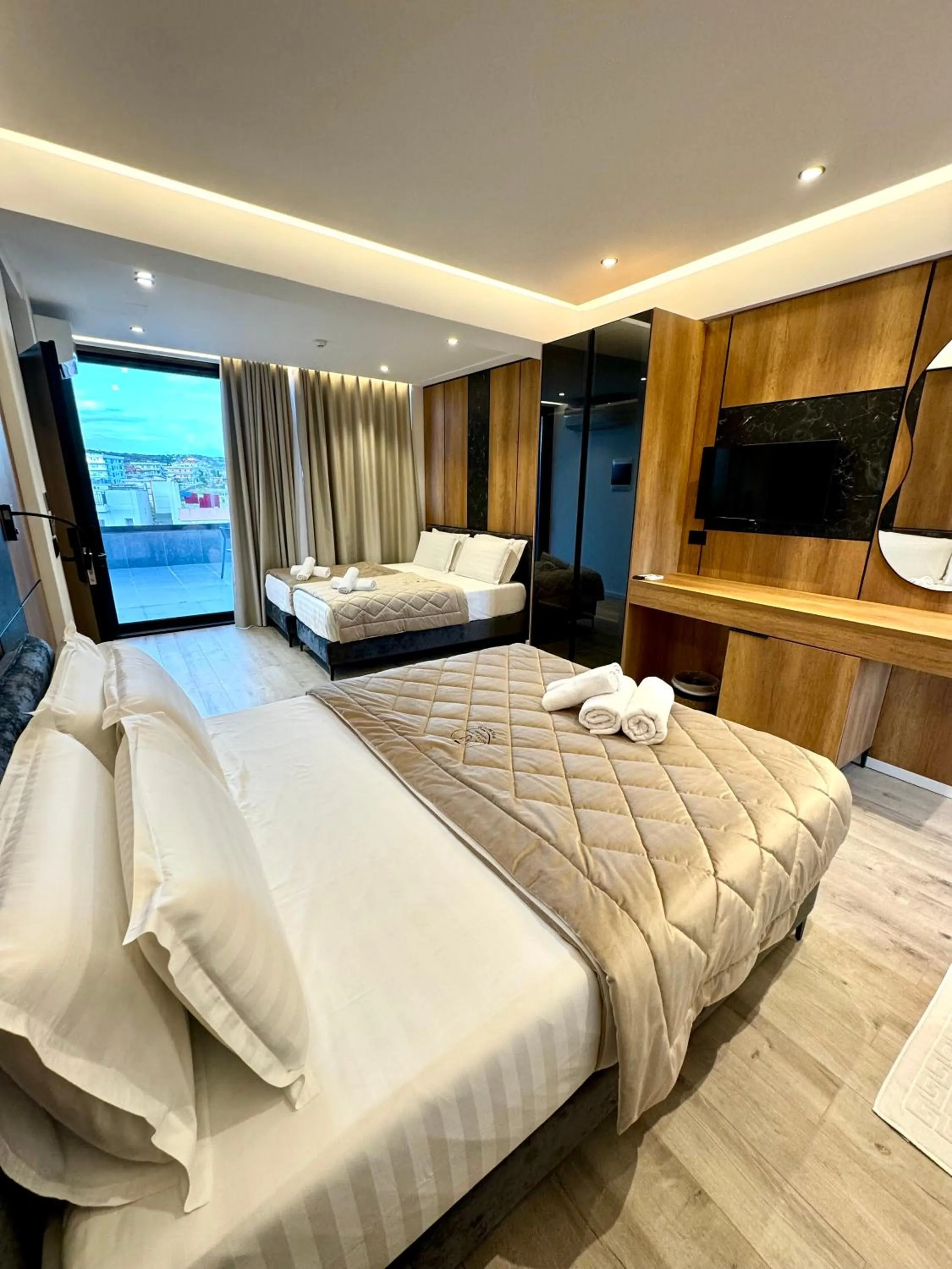 Communal lounge/ TV room, Bed in Hotel Joni Premium