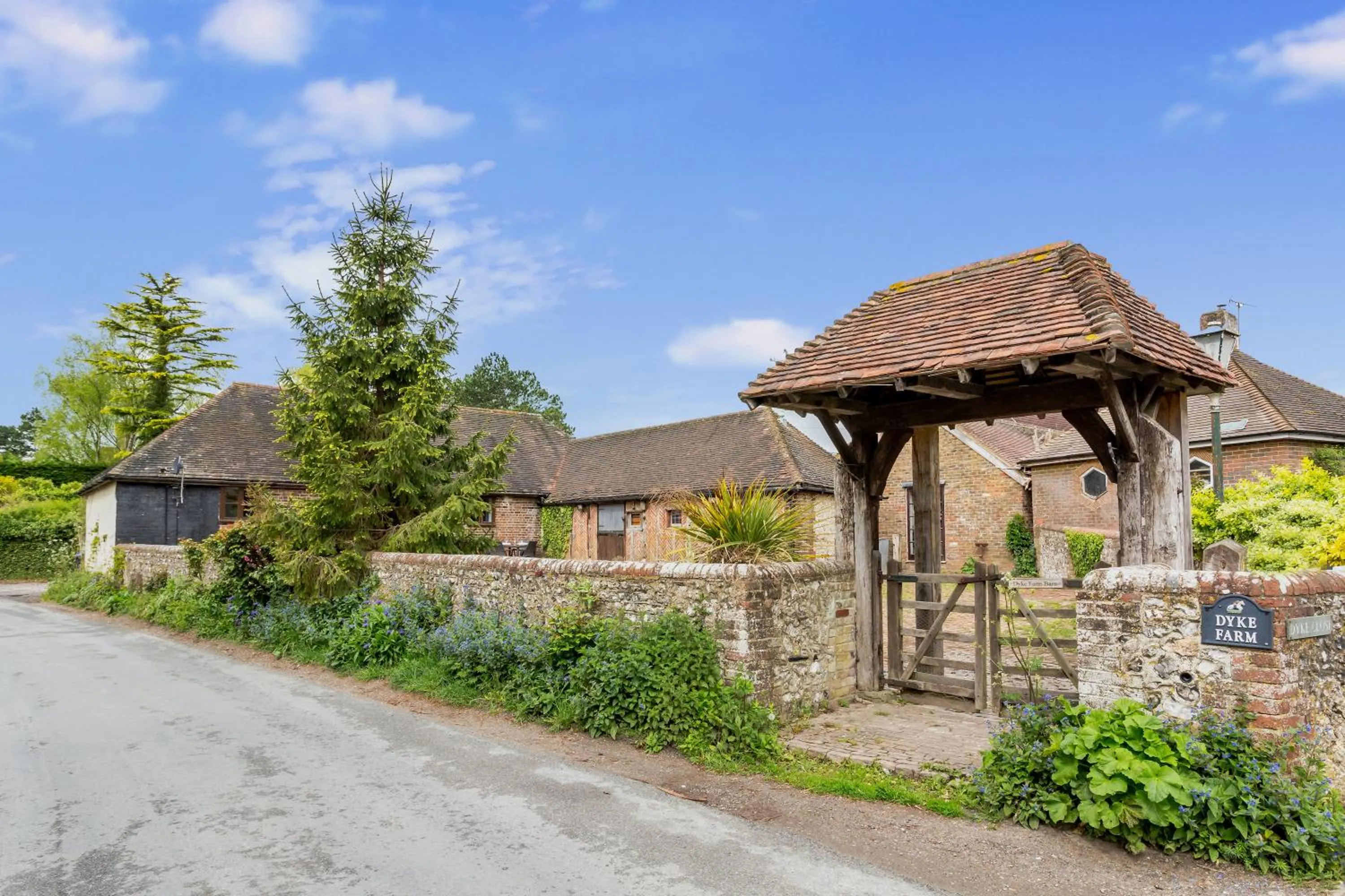 Property building in Dyke Farm Barn near Brighton by Huluki Sussex Stays
