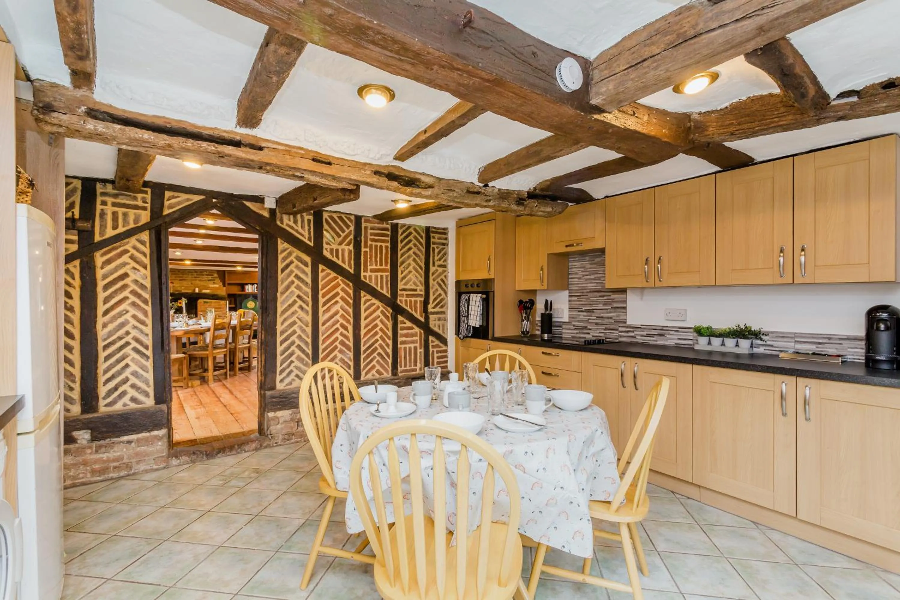 Kitchen or kitchenette in Dyke Farm Barn near Brighton by Huluki Sussex Stays