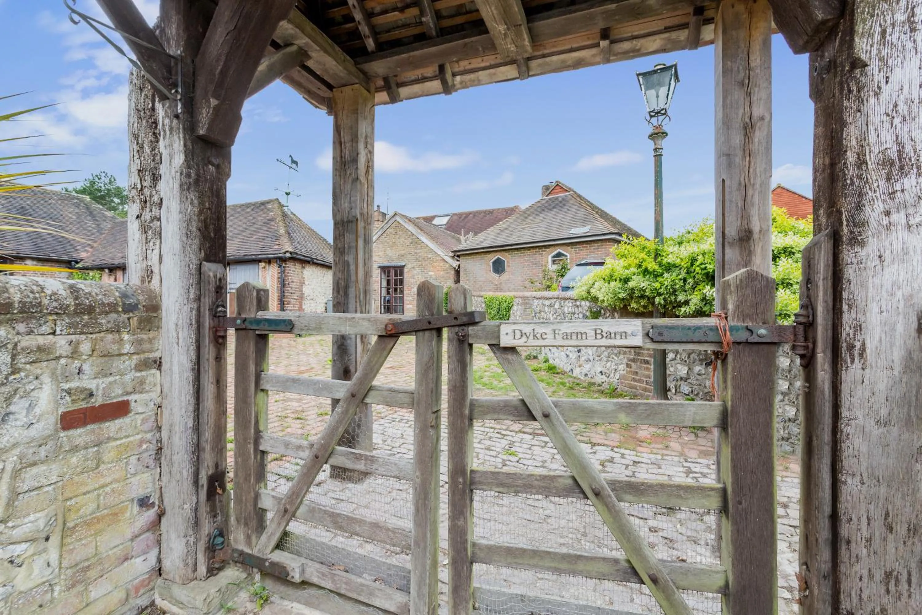 Facade/entrance in Dyke Farm Barn near Brighton by Huluki Sussex Stays