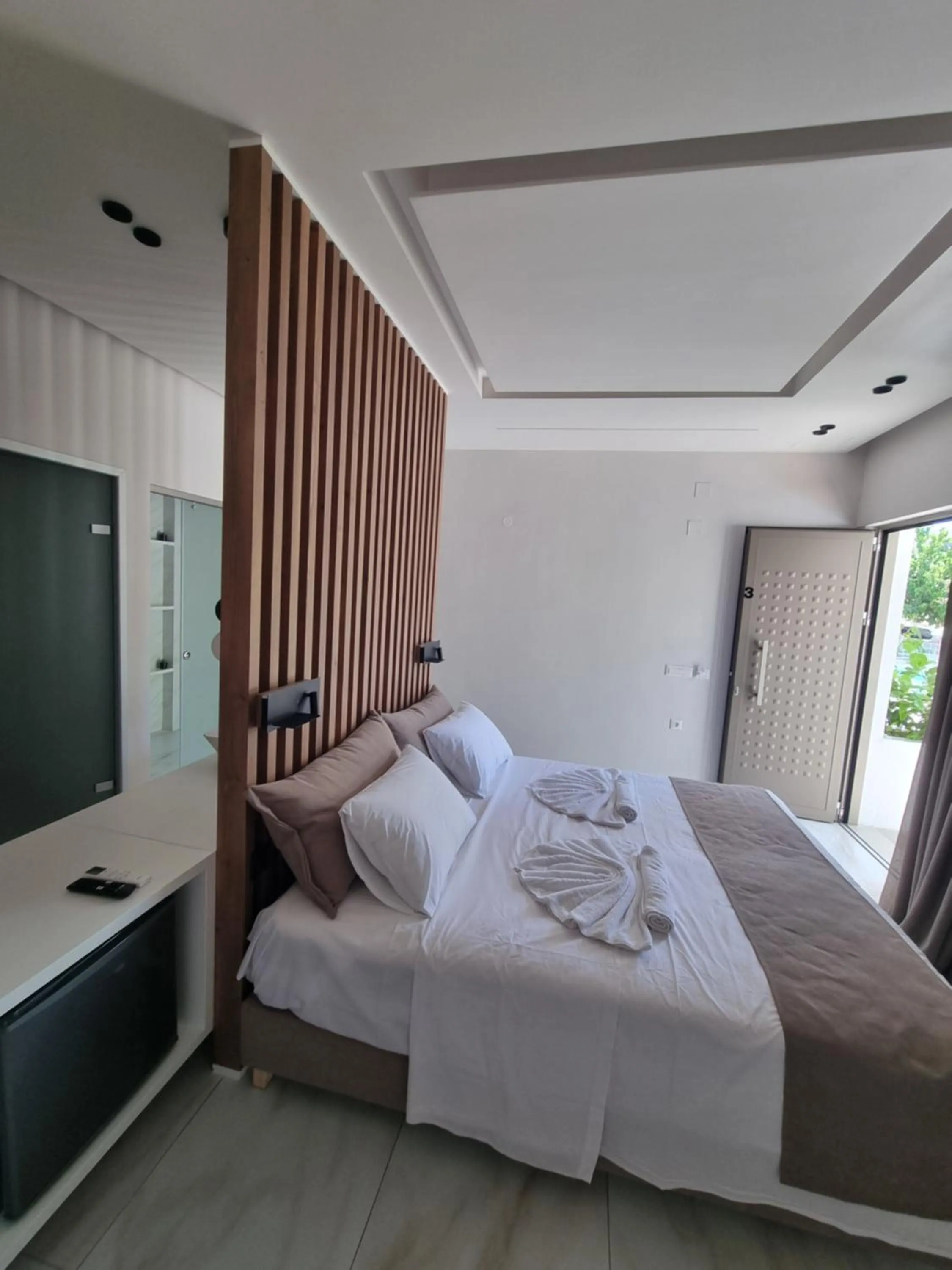 Bed in Leonidas Studios & Apartments