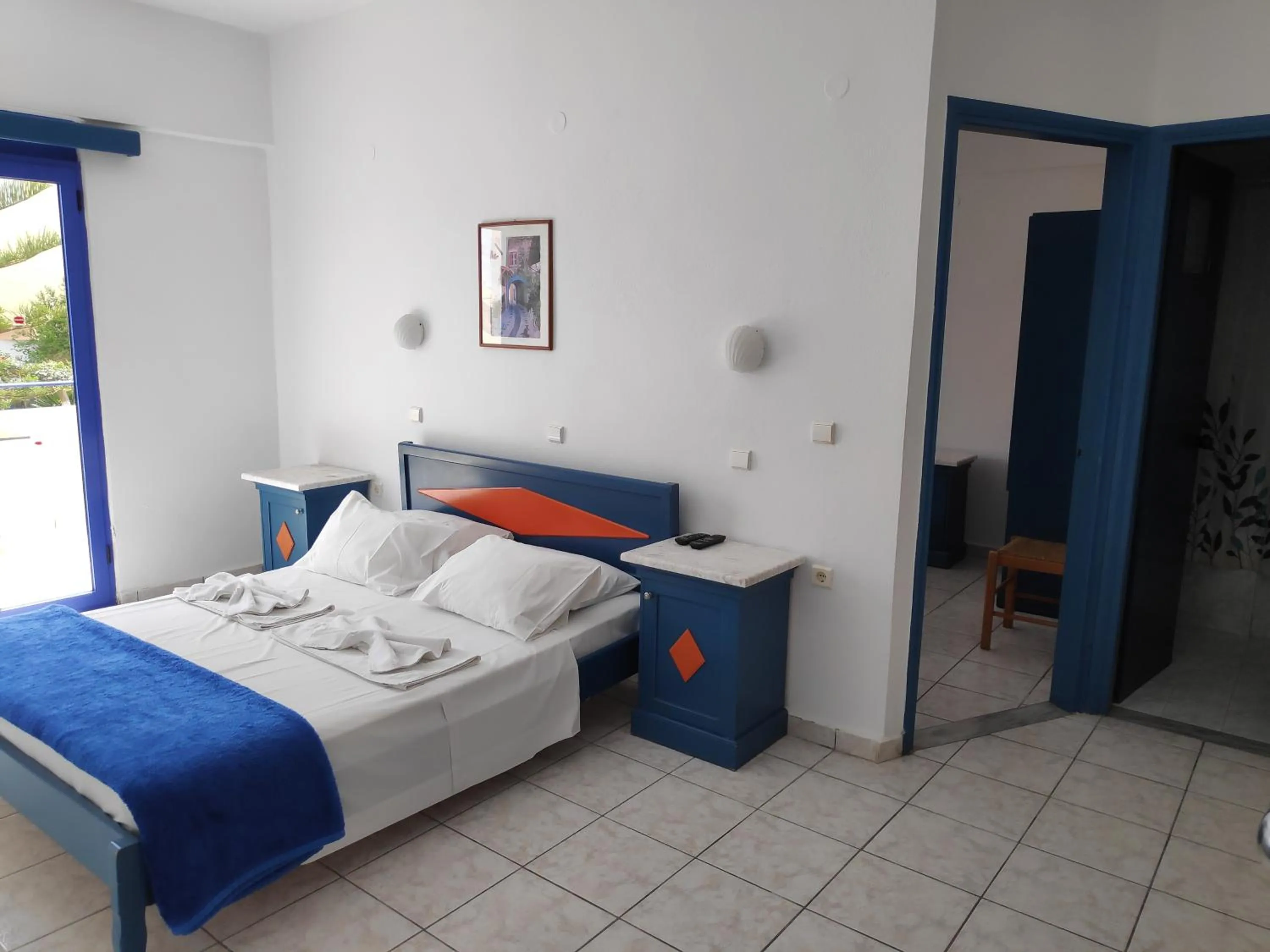 Bed in Leonidas Studios & Apartments