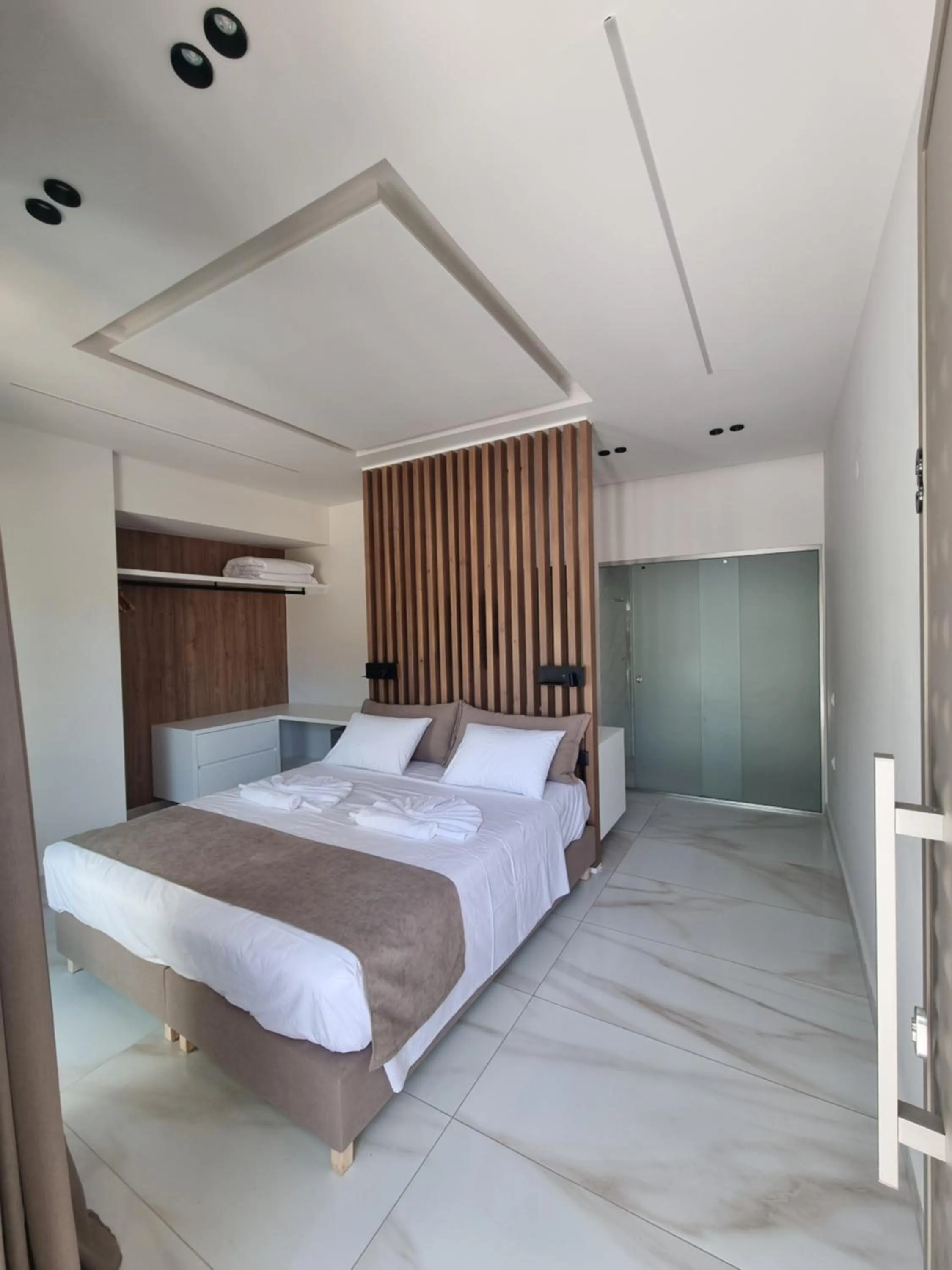 Bed in Leonidas Studios & Apartments