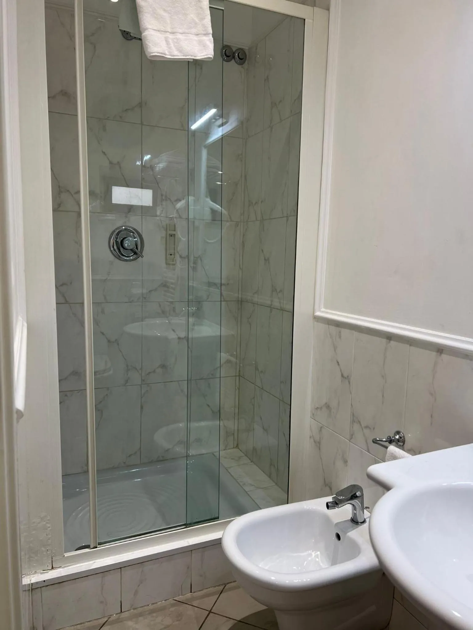 Bathroom in CANELLA HOTEL