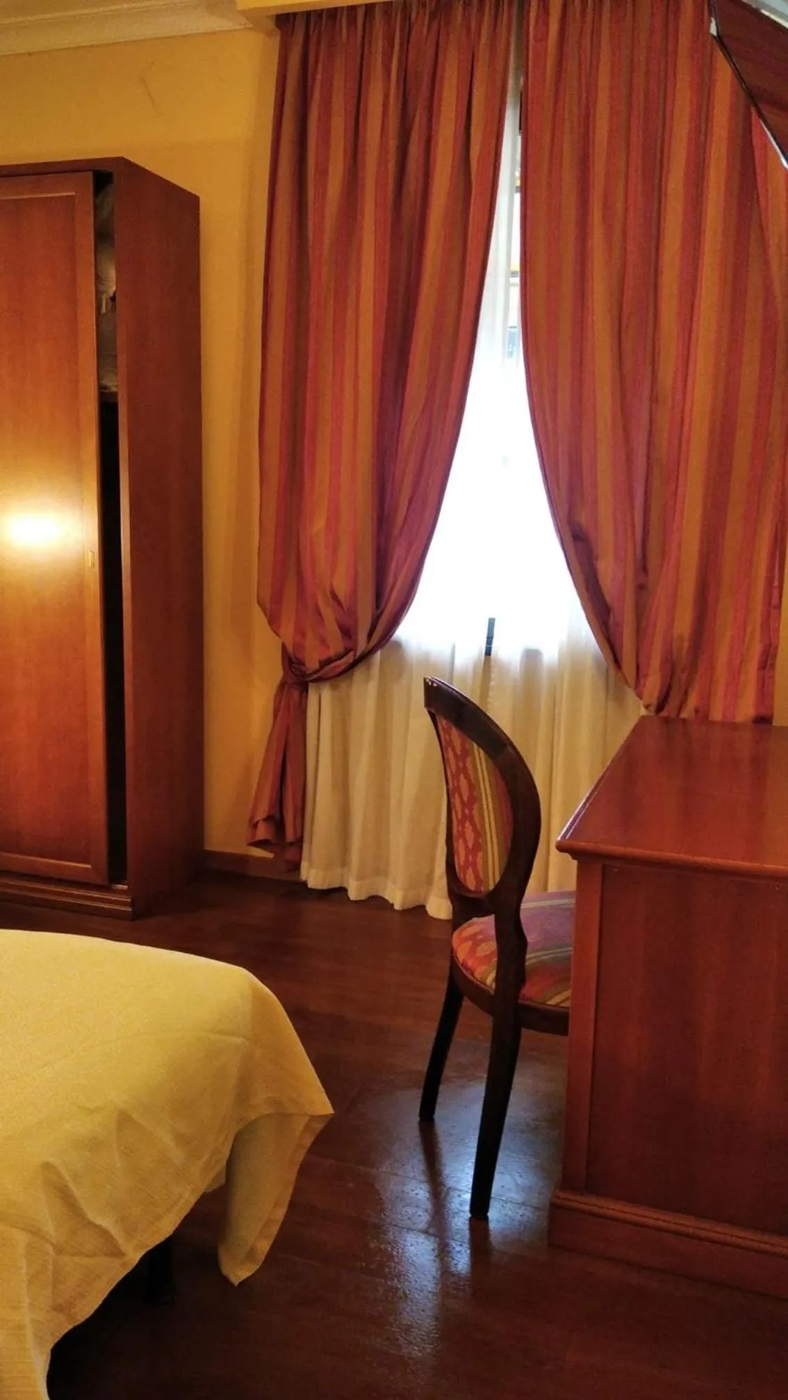 Photo of the whole room, Seating Area in CANELLA HOTEL