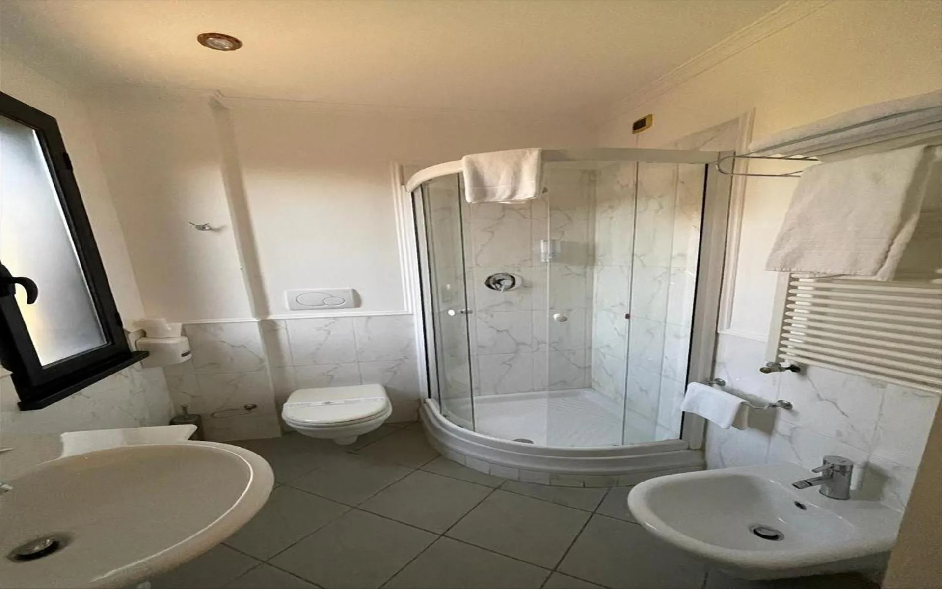 Bathroom in CANELLA HOTEL