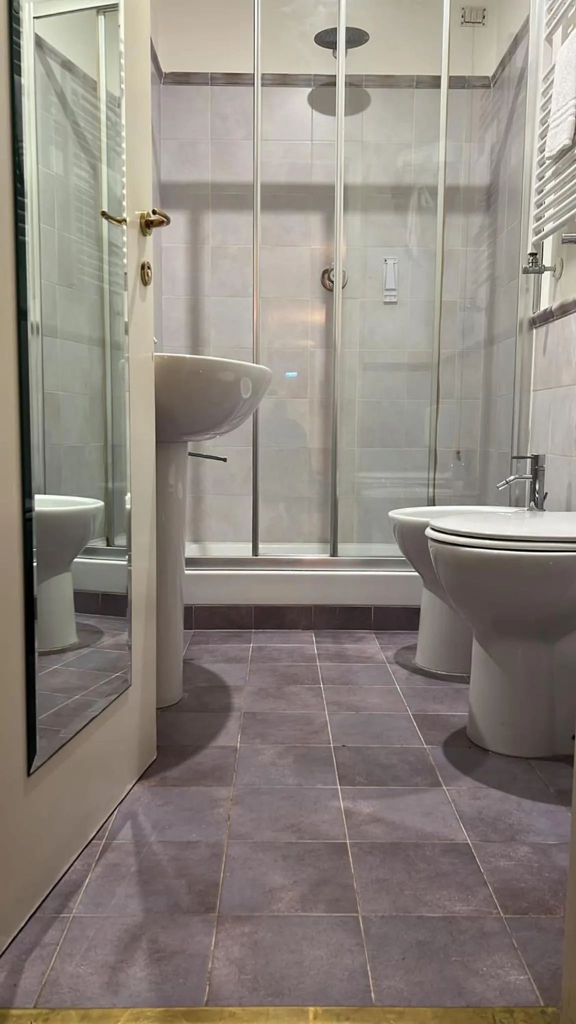 Bathroom in CANELLA HOTEL