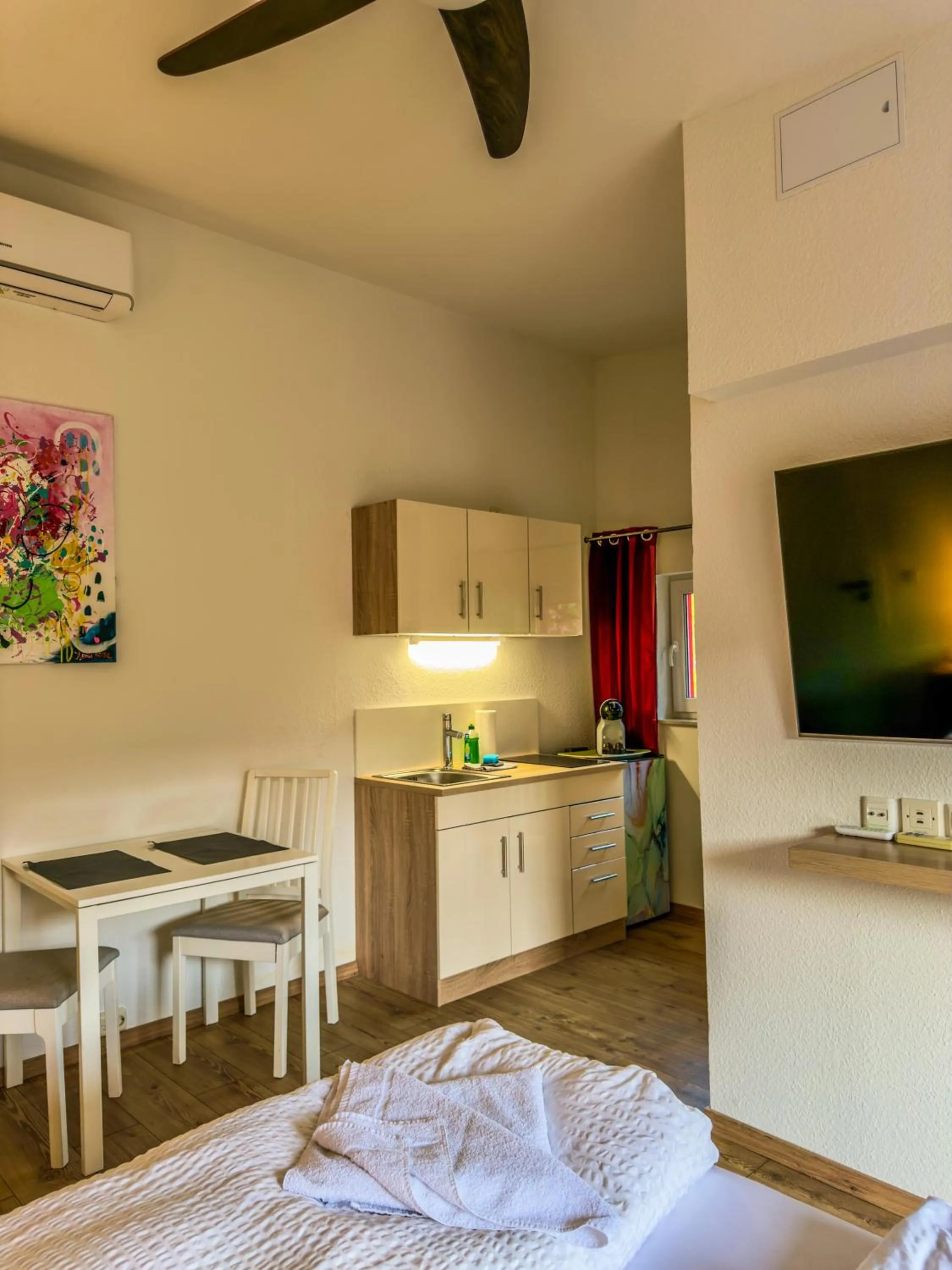 Kitchen or kitchenette, Bed in Appartement Vermietung Brunner