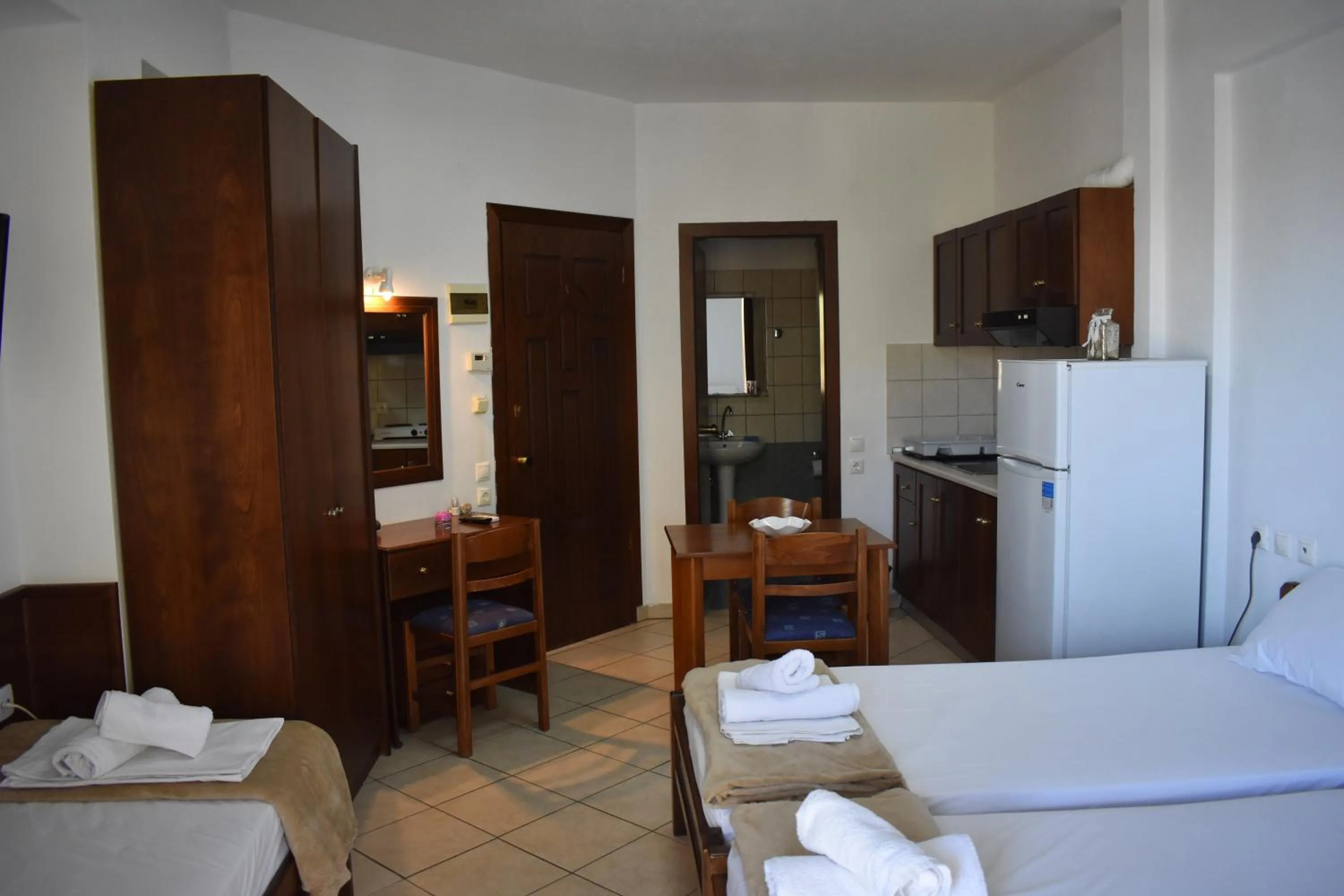 Bed in Galanis Studios and Apartments