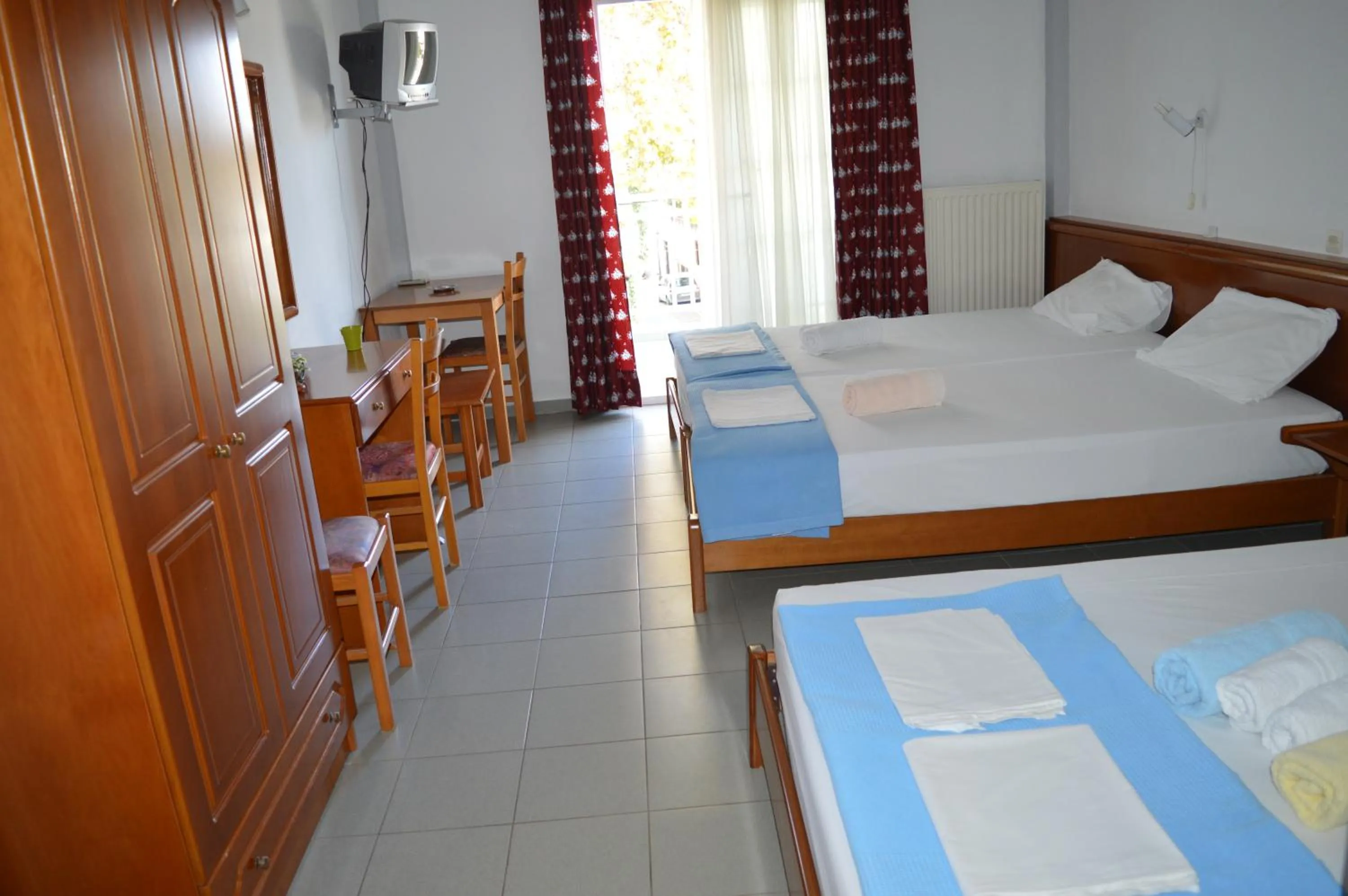 Bed in Galanis Studios and Apartments