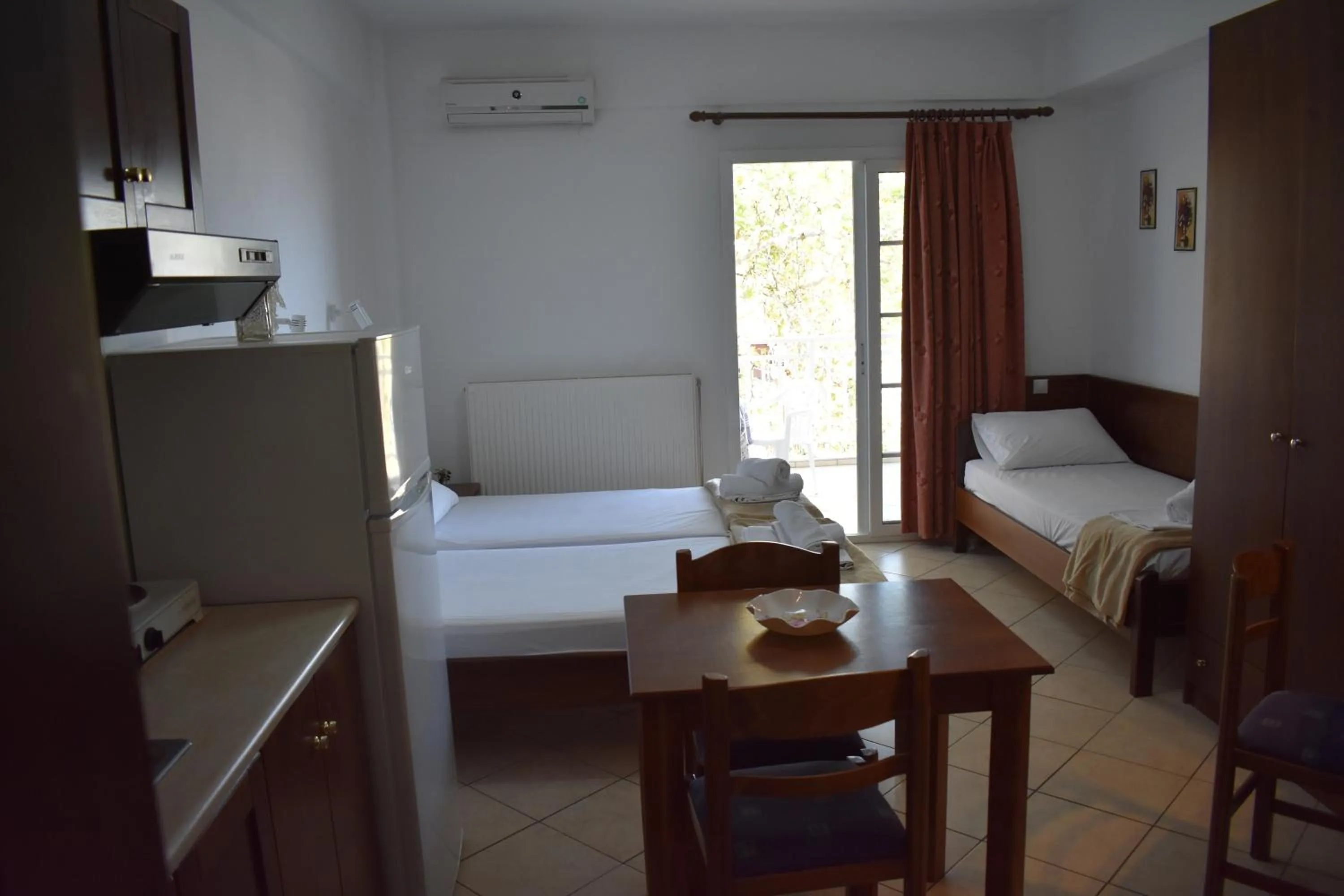 Bed in Galanis Studios and Apartments