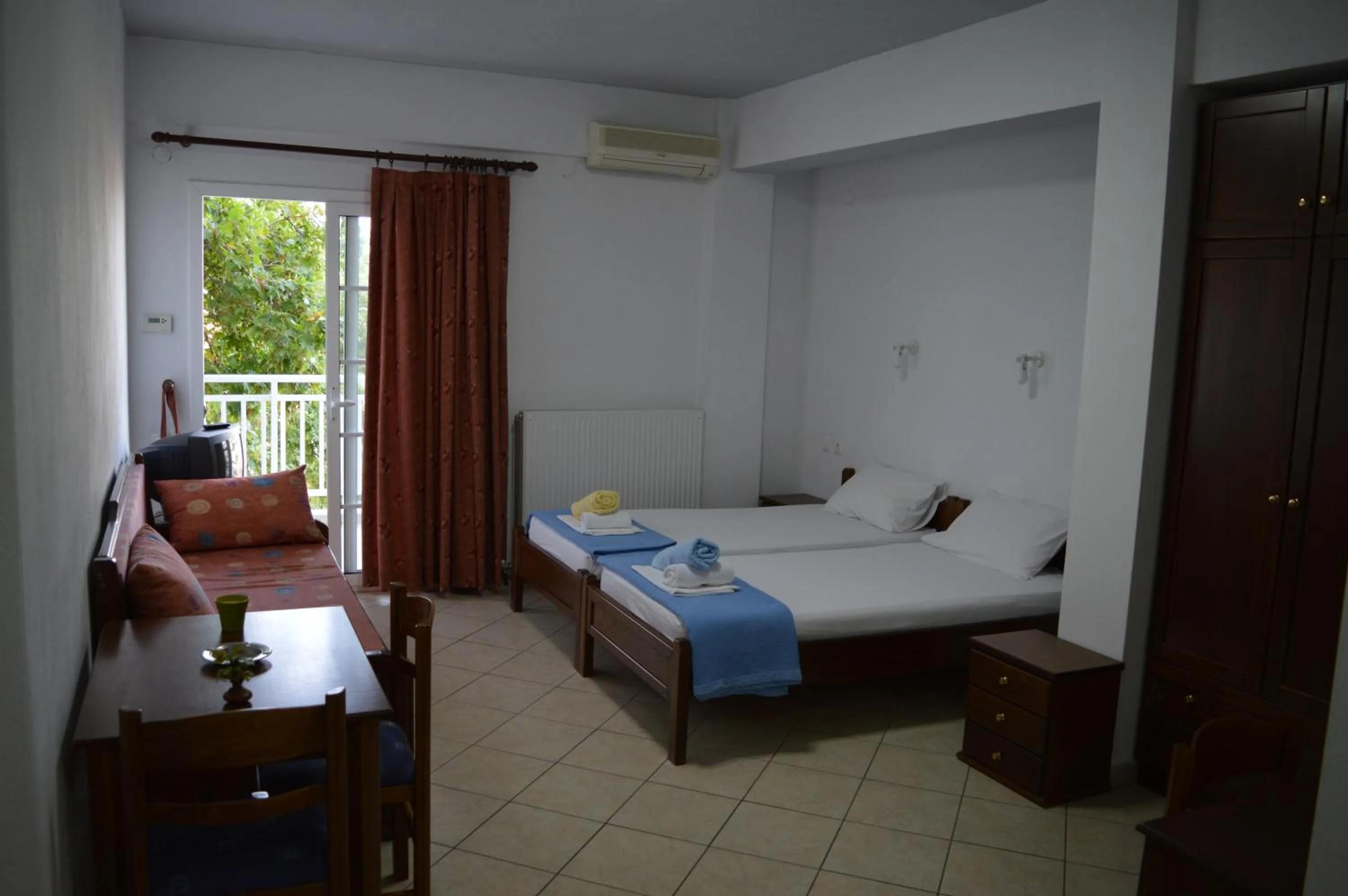 Bed in Galanis Studios and Apartments