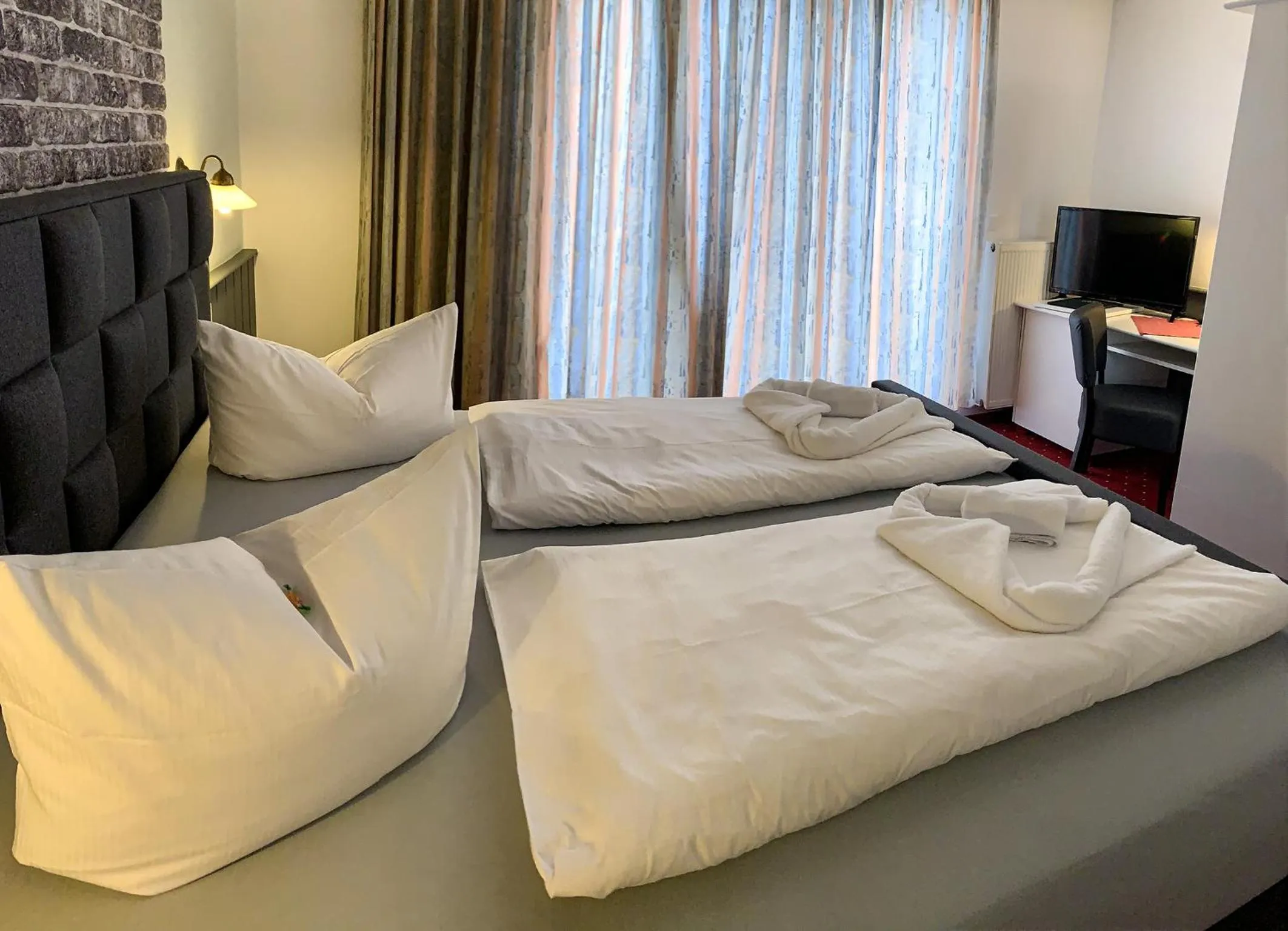 Photo of the whole room, Bed in Hotel Carl von Clausewitz