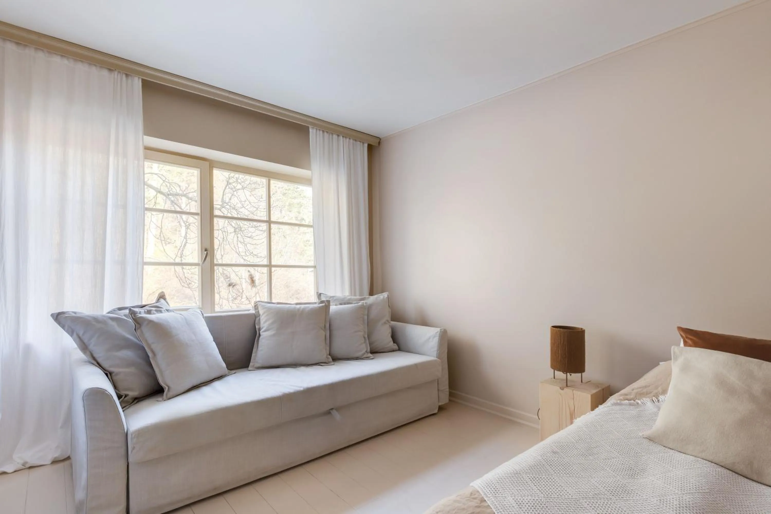 Seating area, Bed in Nidos Banga