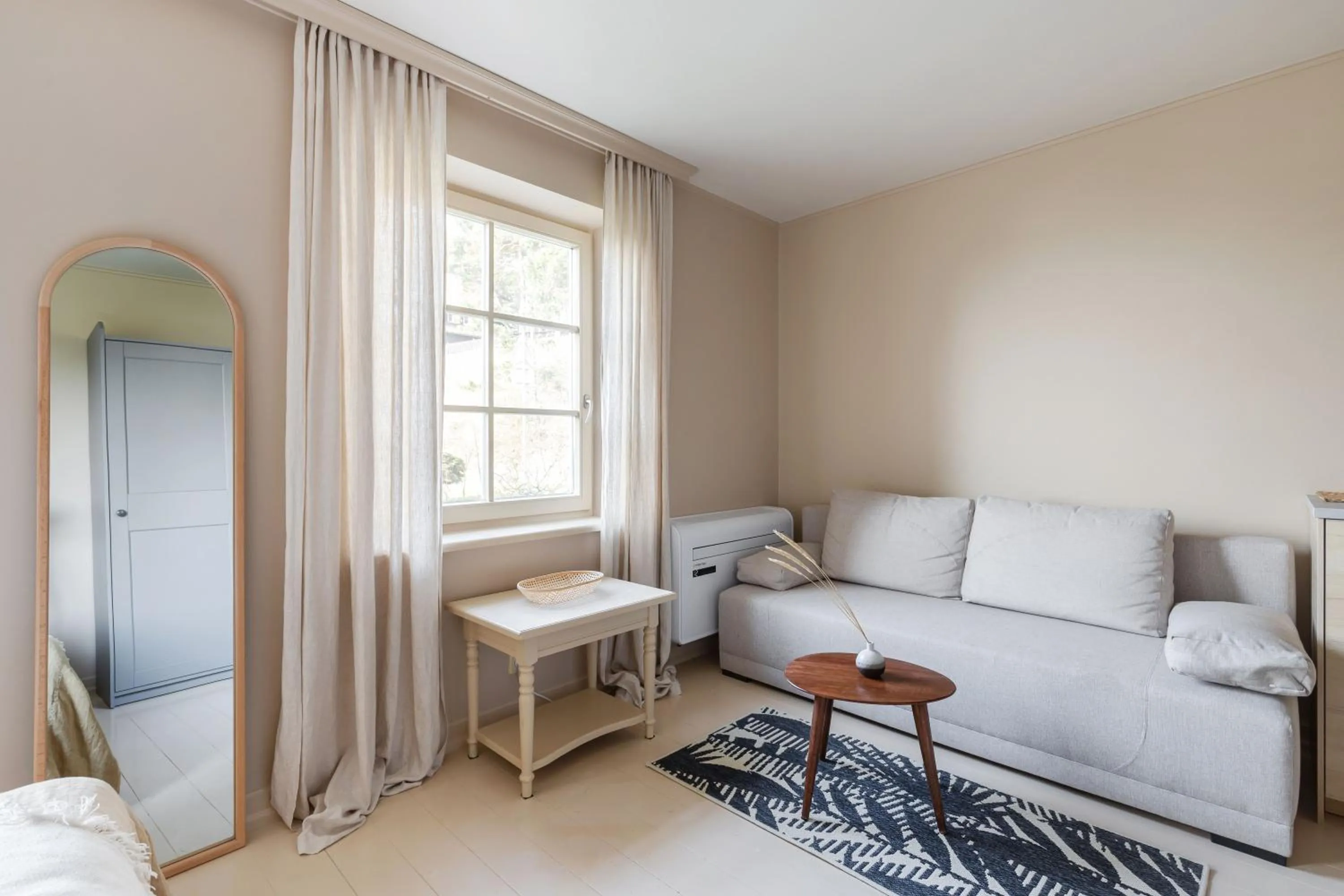 Seating area, Bed in Nidos Banga