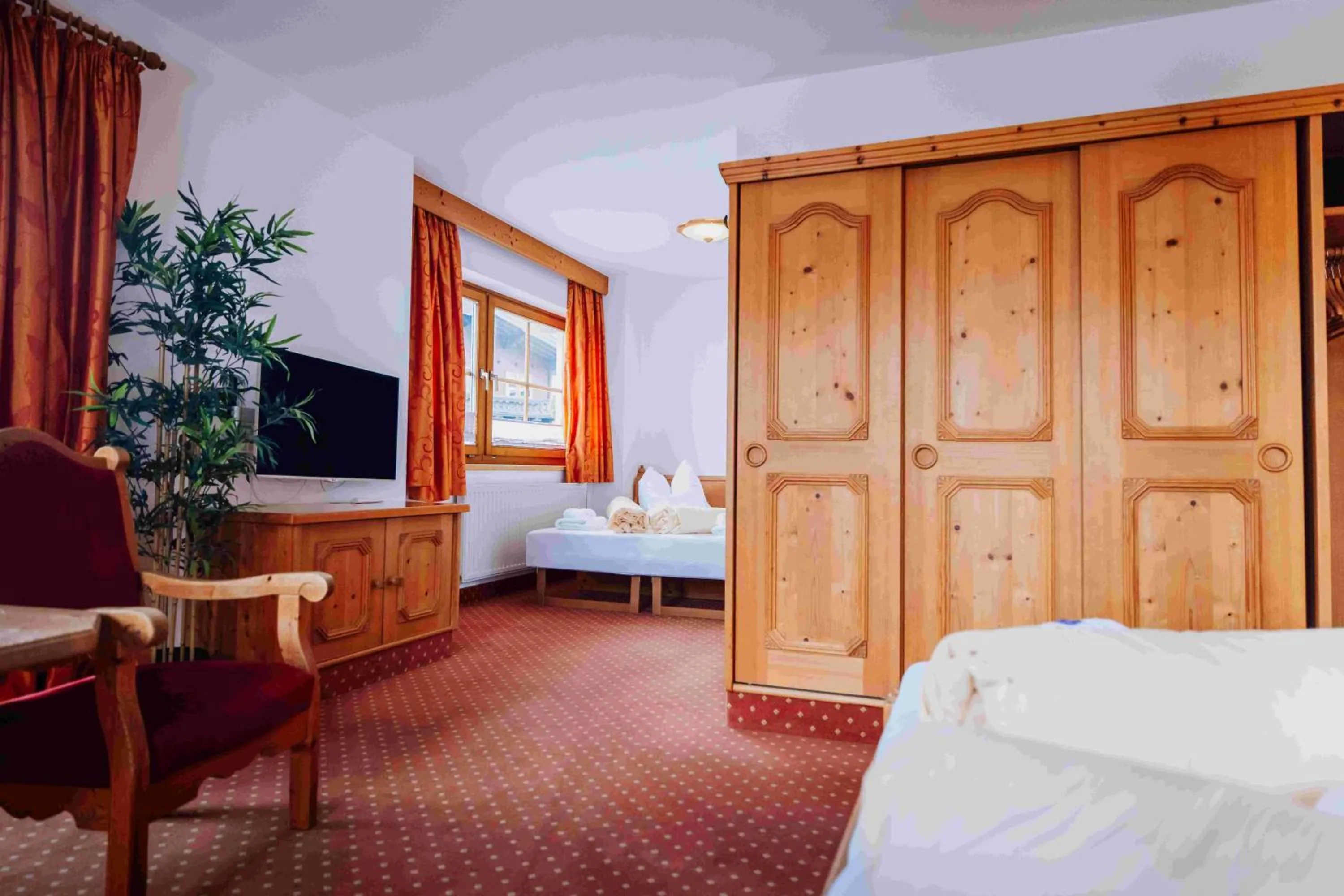 Bed in Hotel in the HEART of the Alps