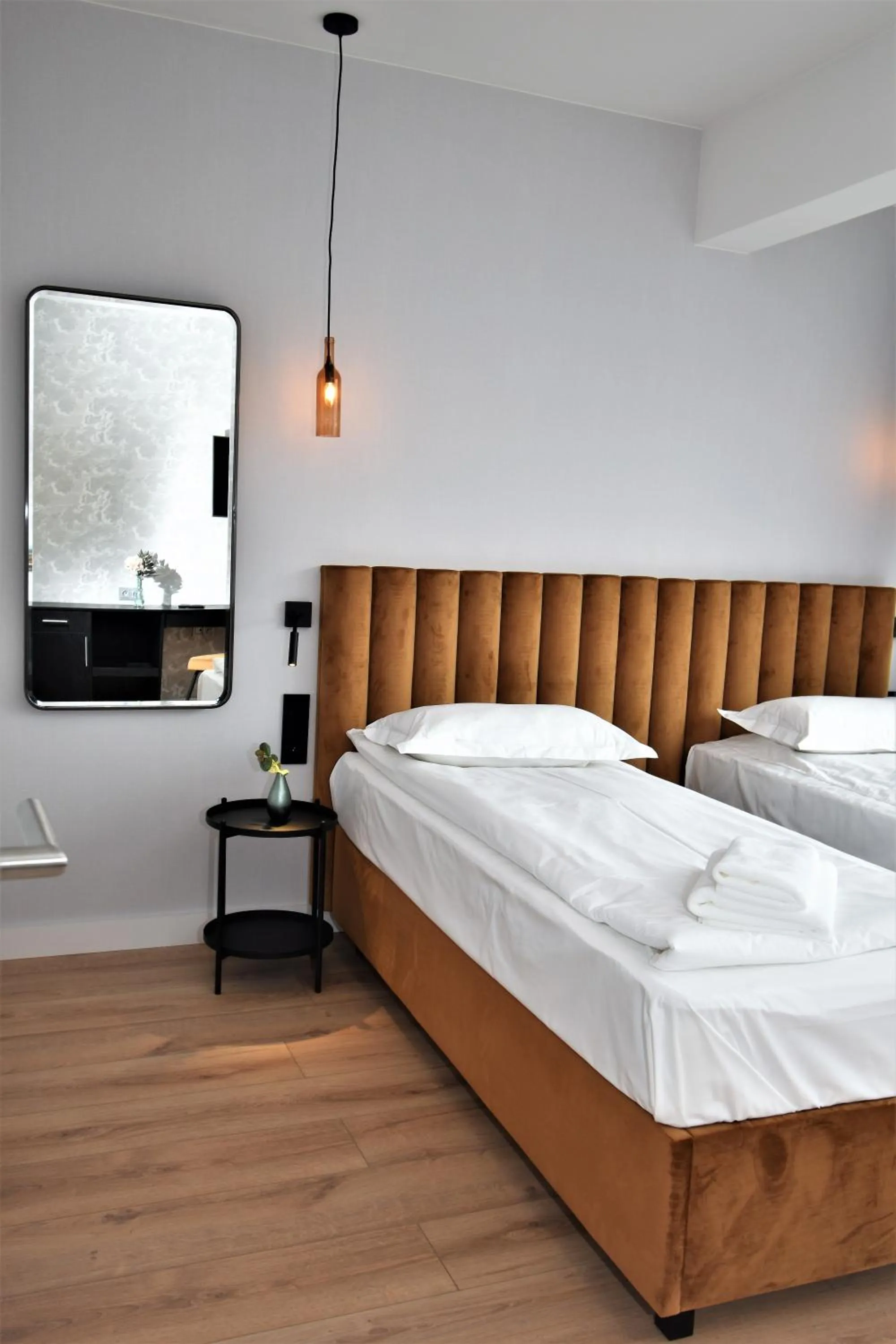 Bed in Patio Riverfront Aparthotel