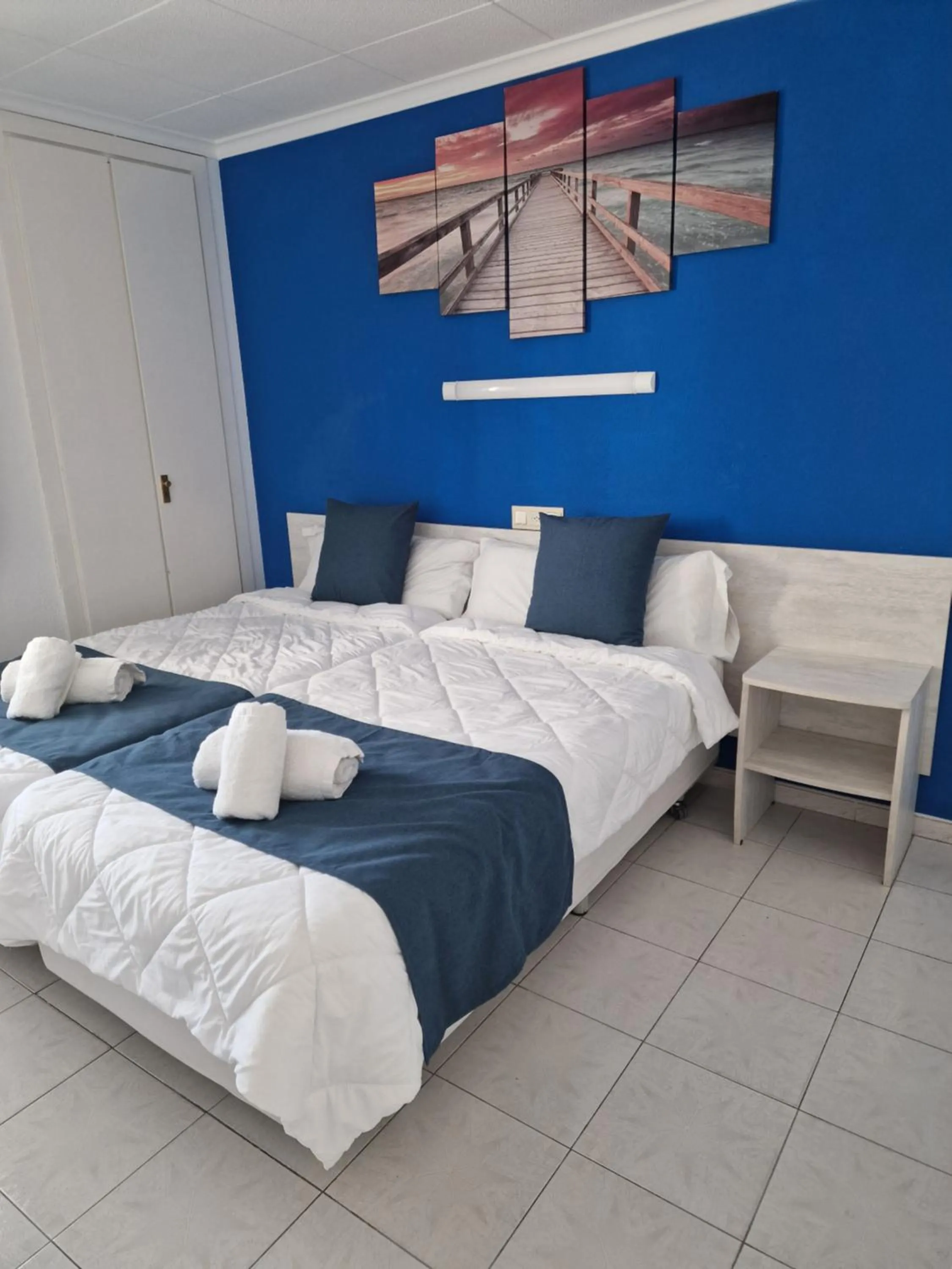 Bed in Europa Family Apartments