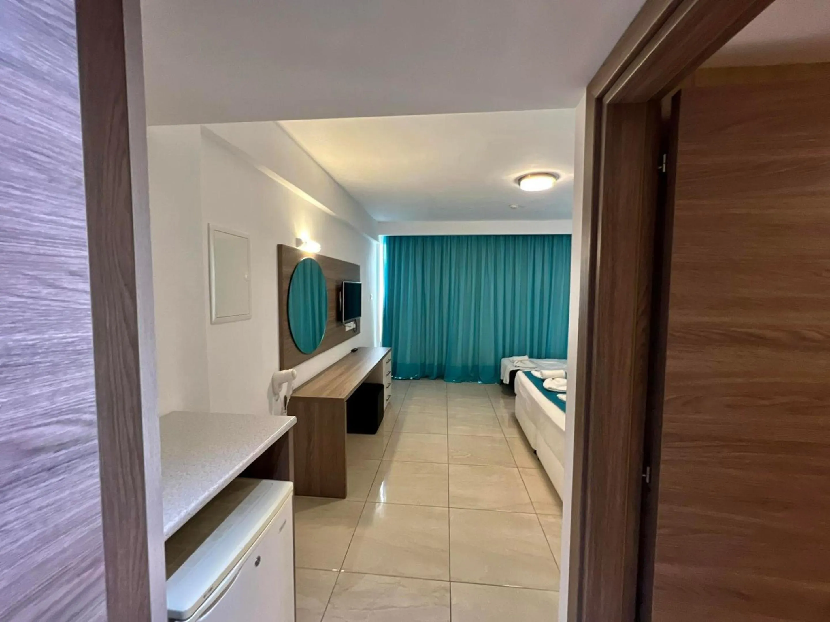 Bed in Sunny Blue Hotel