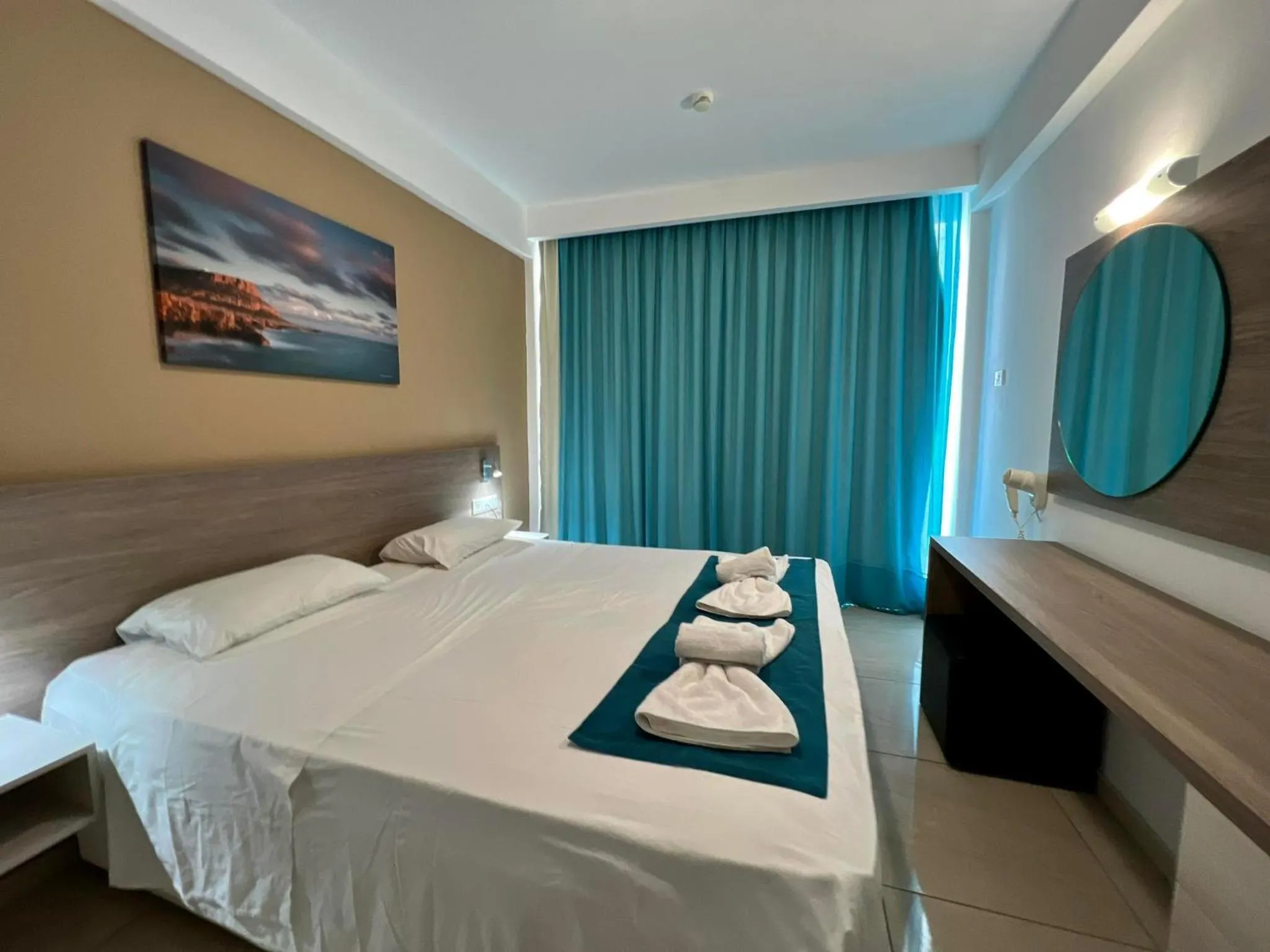 Bed in Sunny Blue Hotel