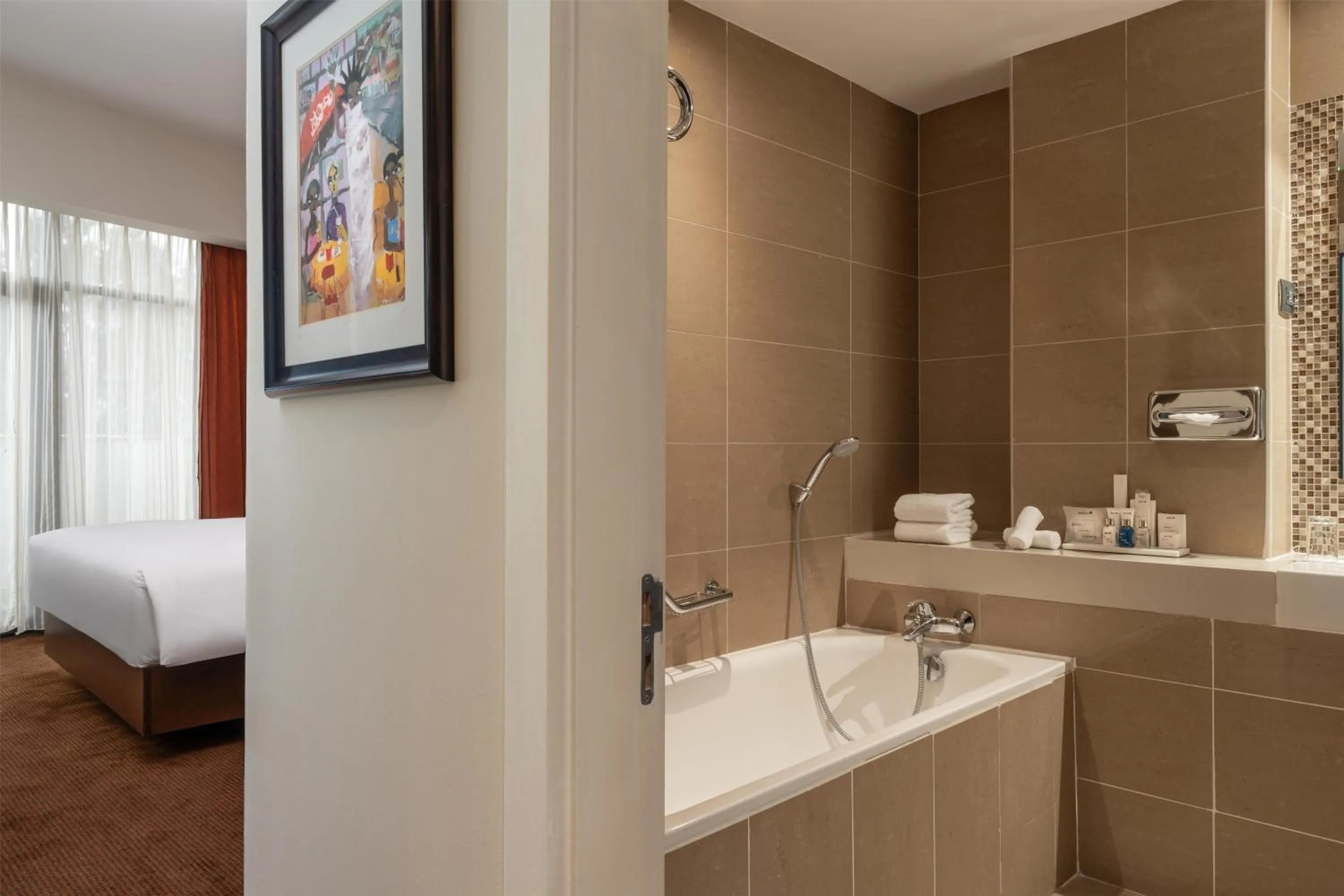 Bathroom, Bed in Radisson Blu Hotel, Addis Ababa
