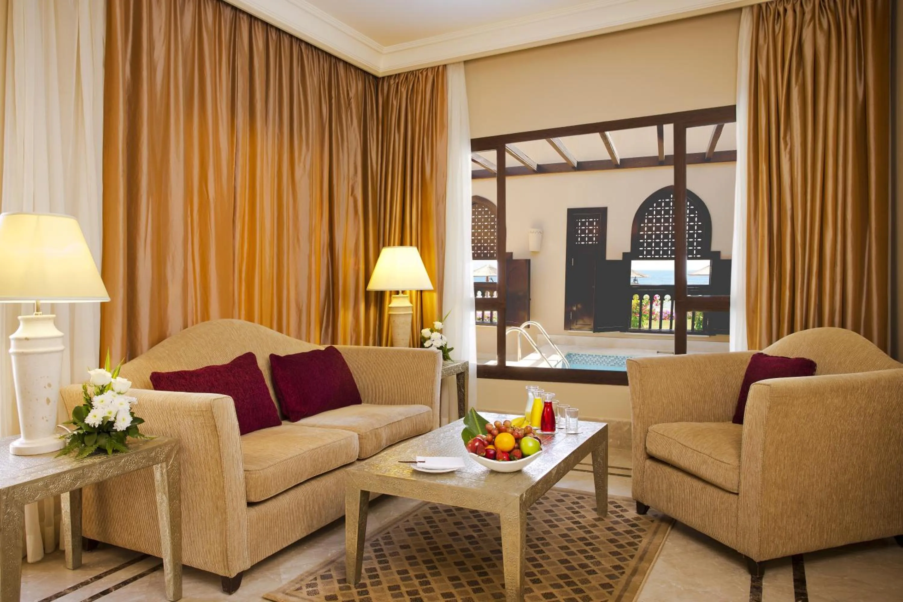 Living room in Miramar Al Aqah Beach Resort