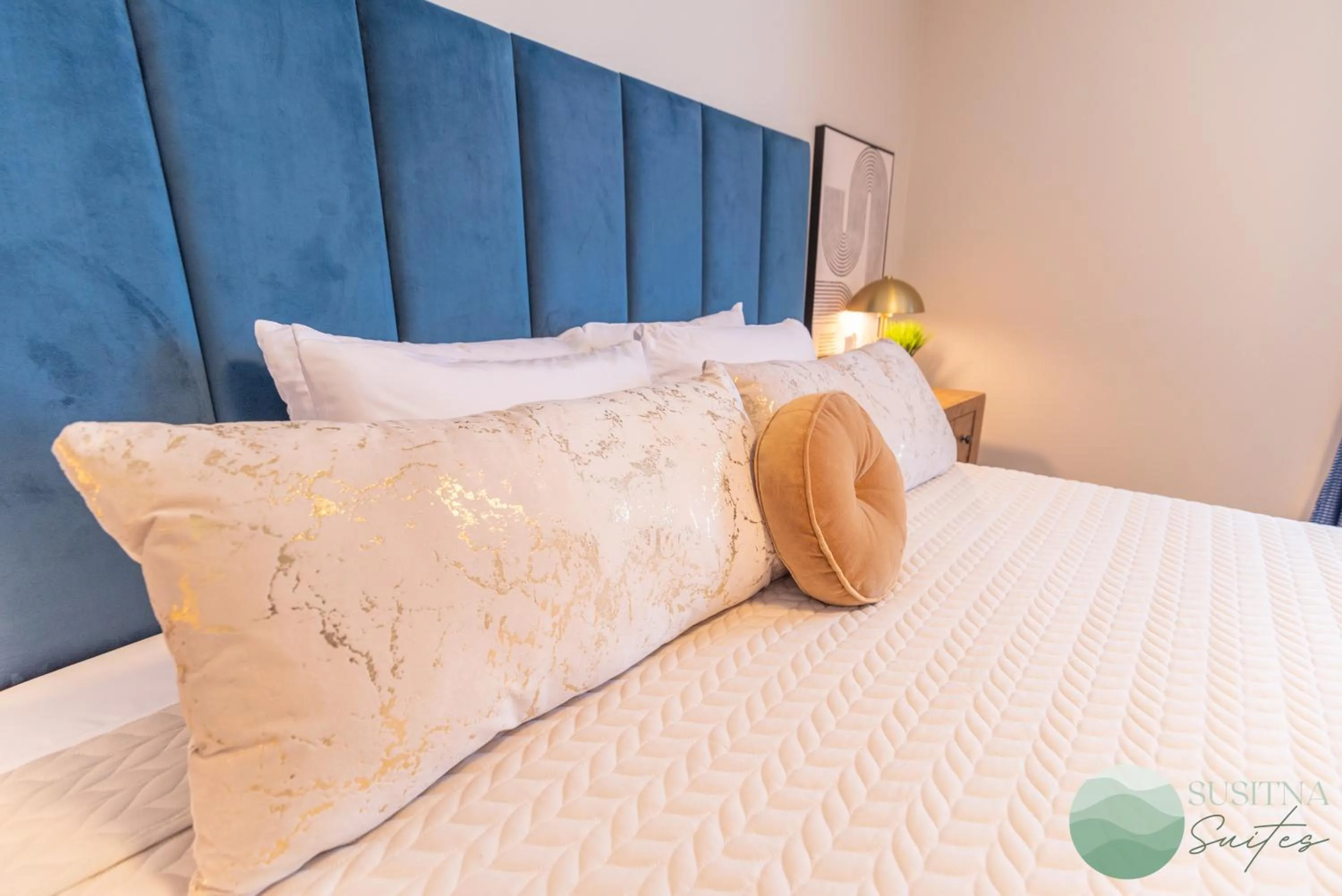 Bed in Susitna Suites