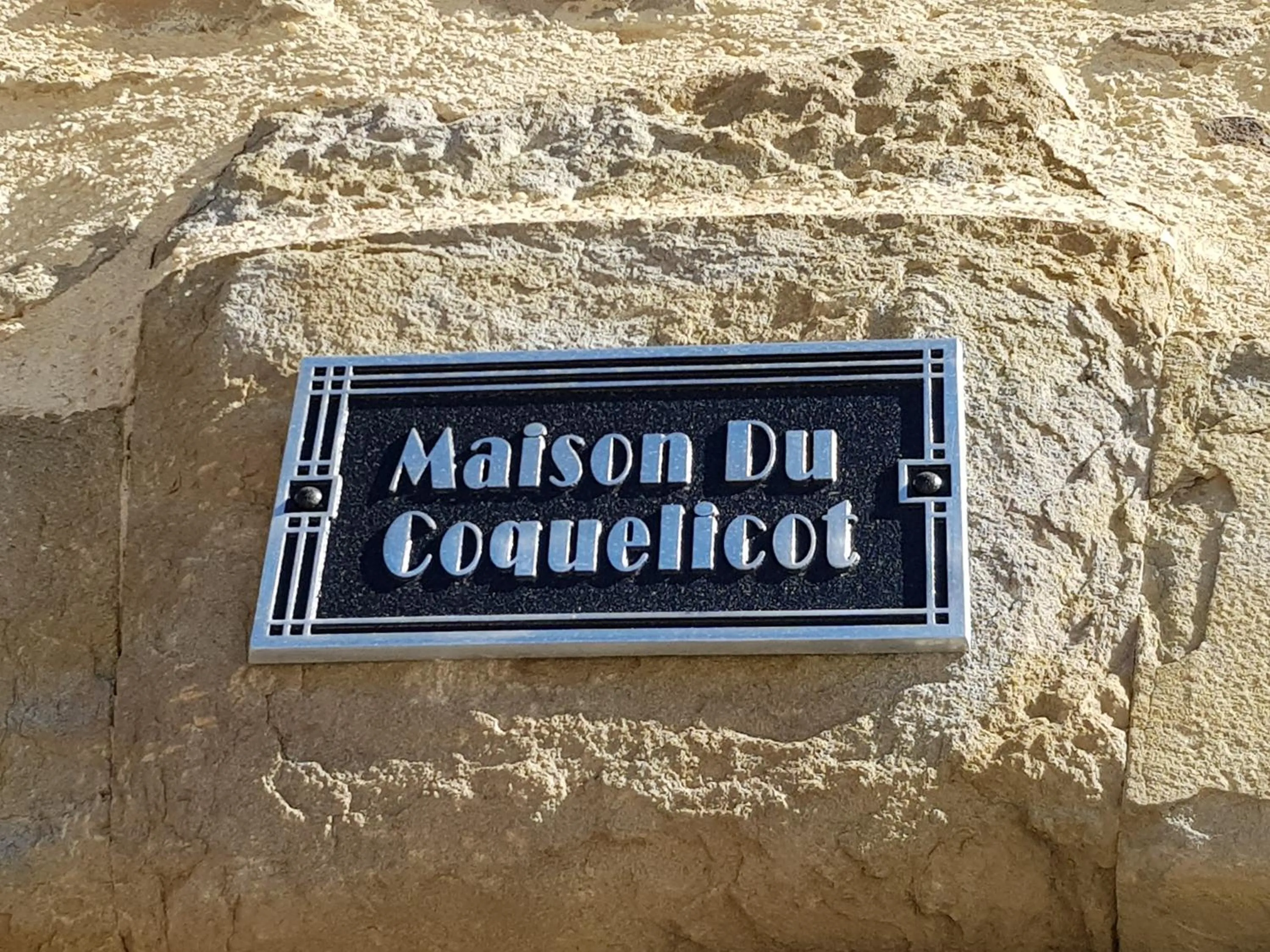 Property logo or sign in Maison du Coquelicot