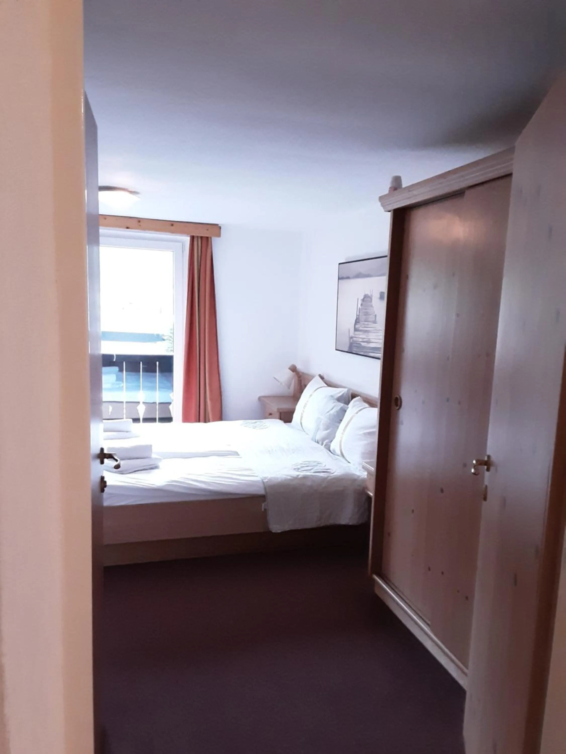 Bed in Apartment House Seerose self check-in