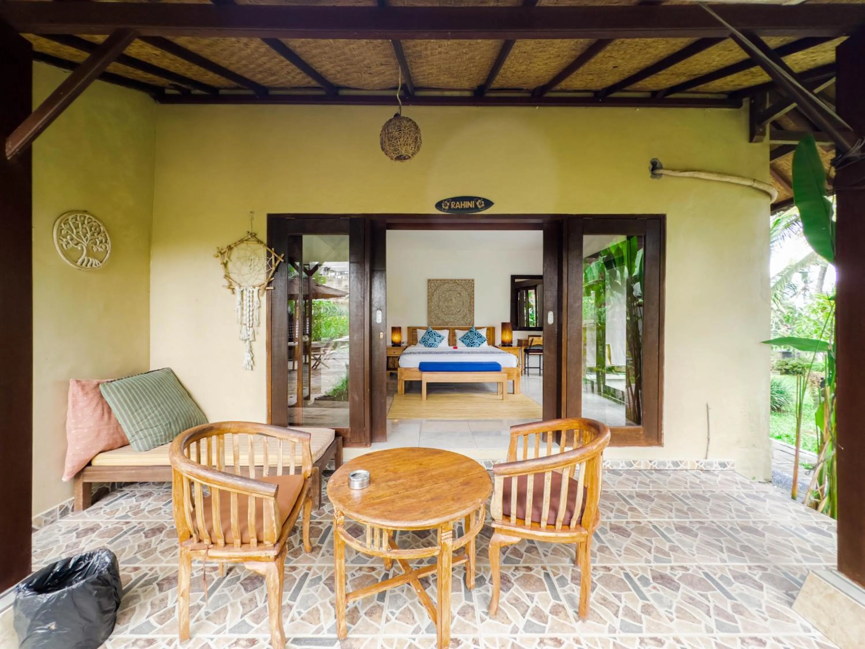 Seating area in Ubud Shanti Rice Field House By Supala