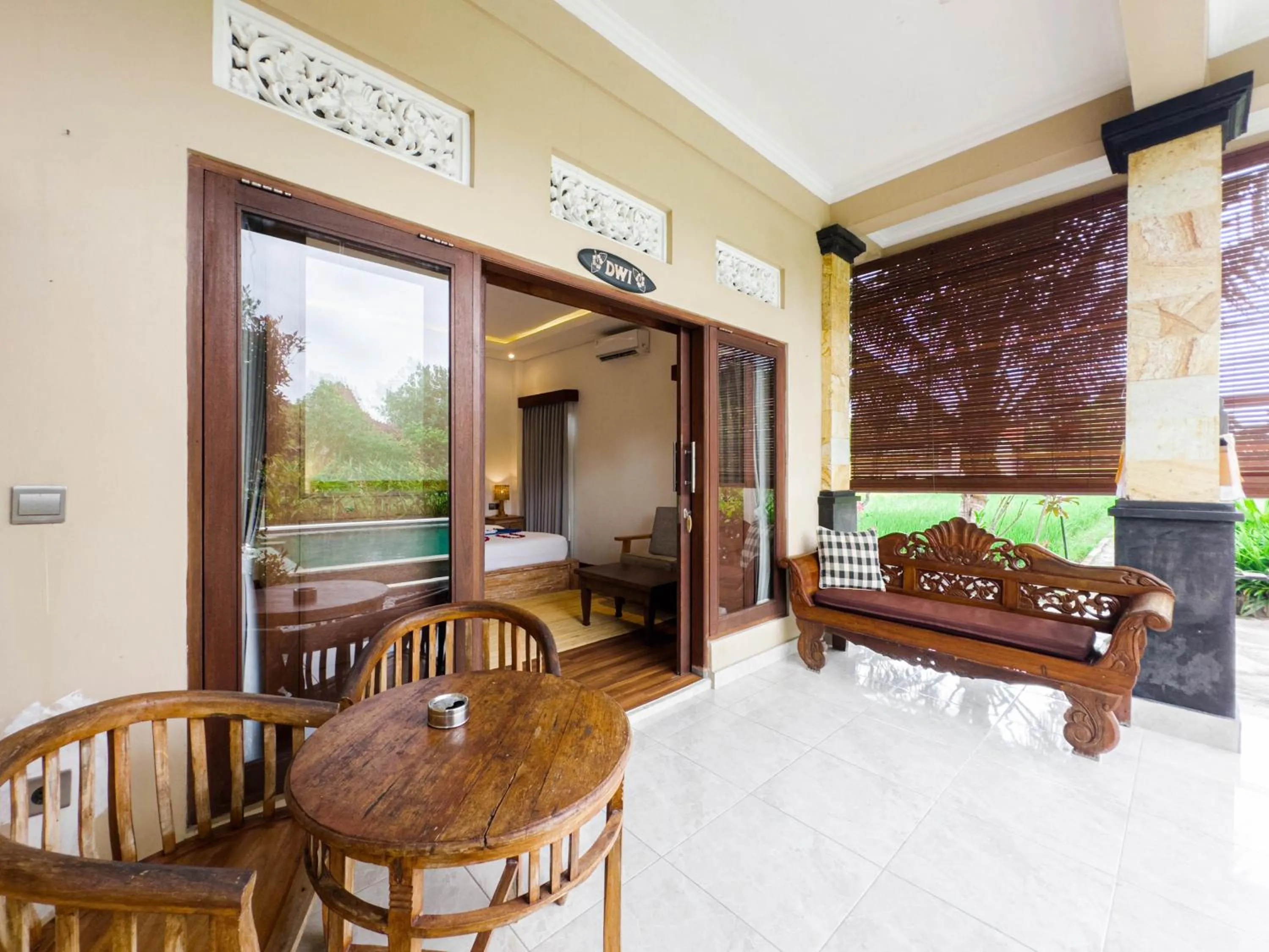 Seating area in Ubud Shanti Rice Field House By Supala