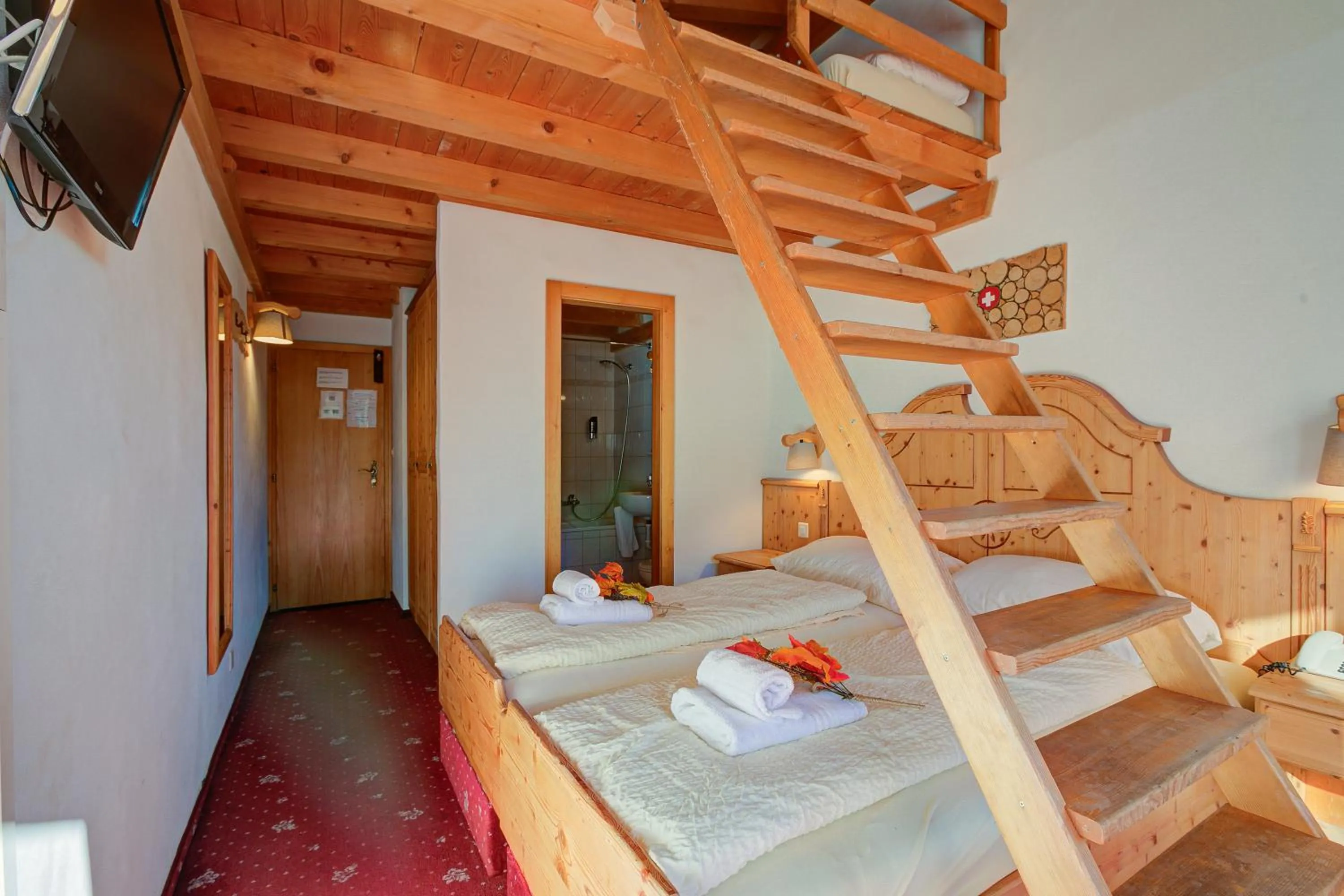 Bed in Hotel Relais Alpin