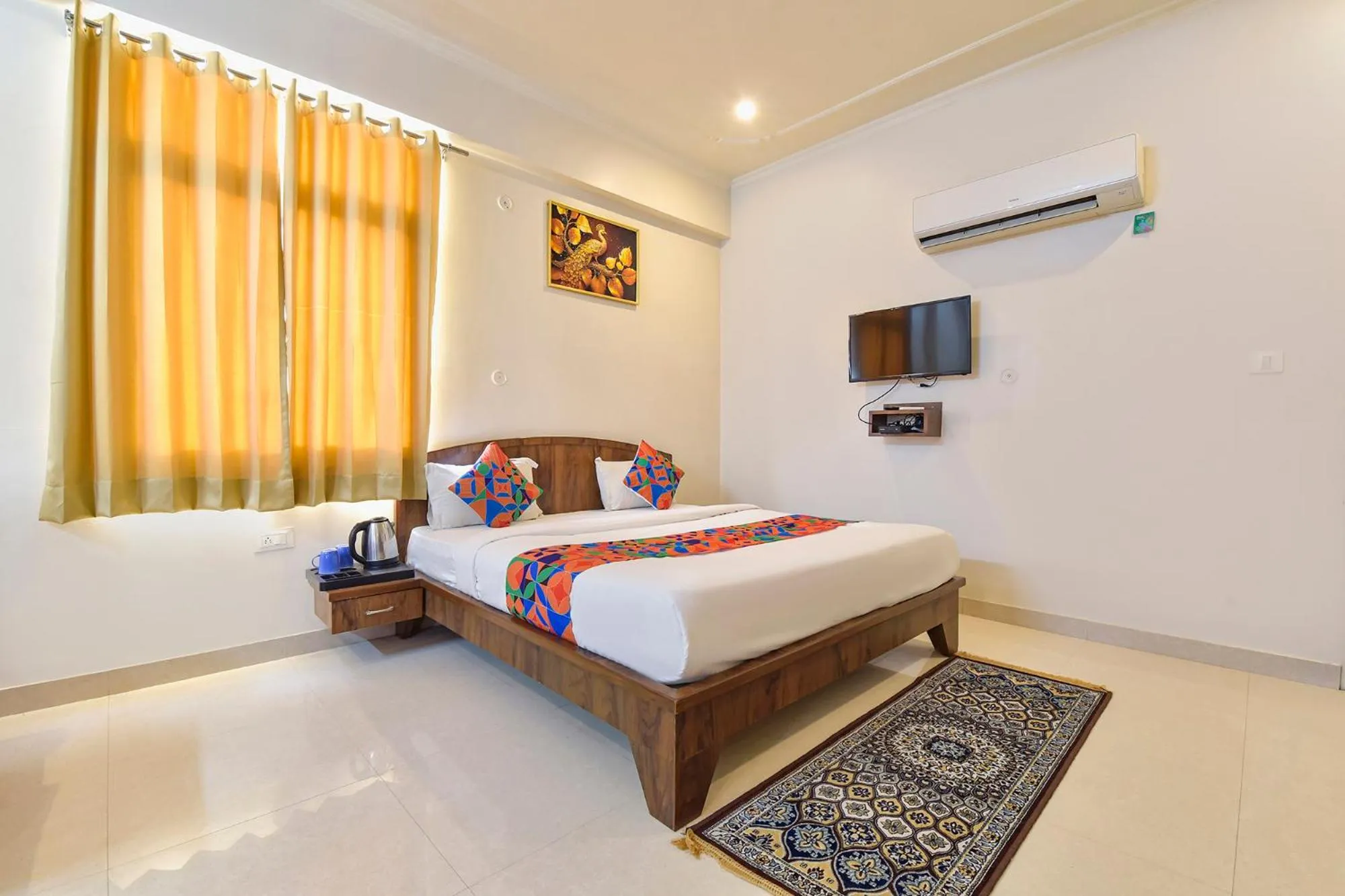 Bed in FabHotel Shiv Palace