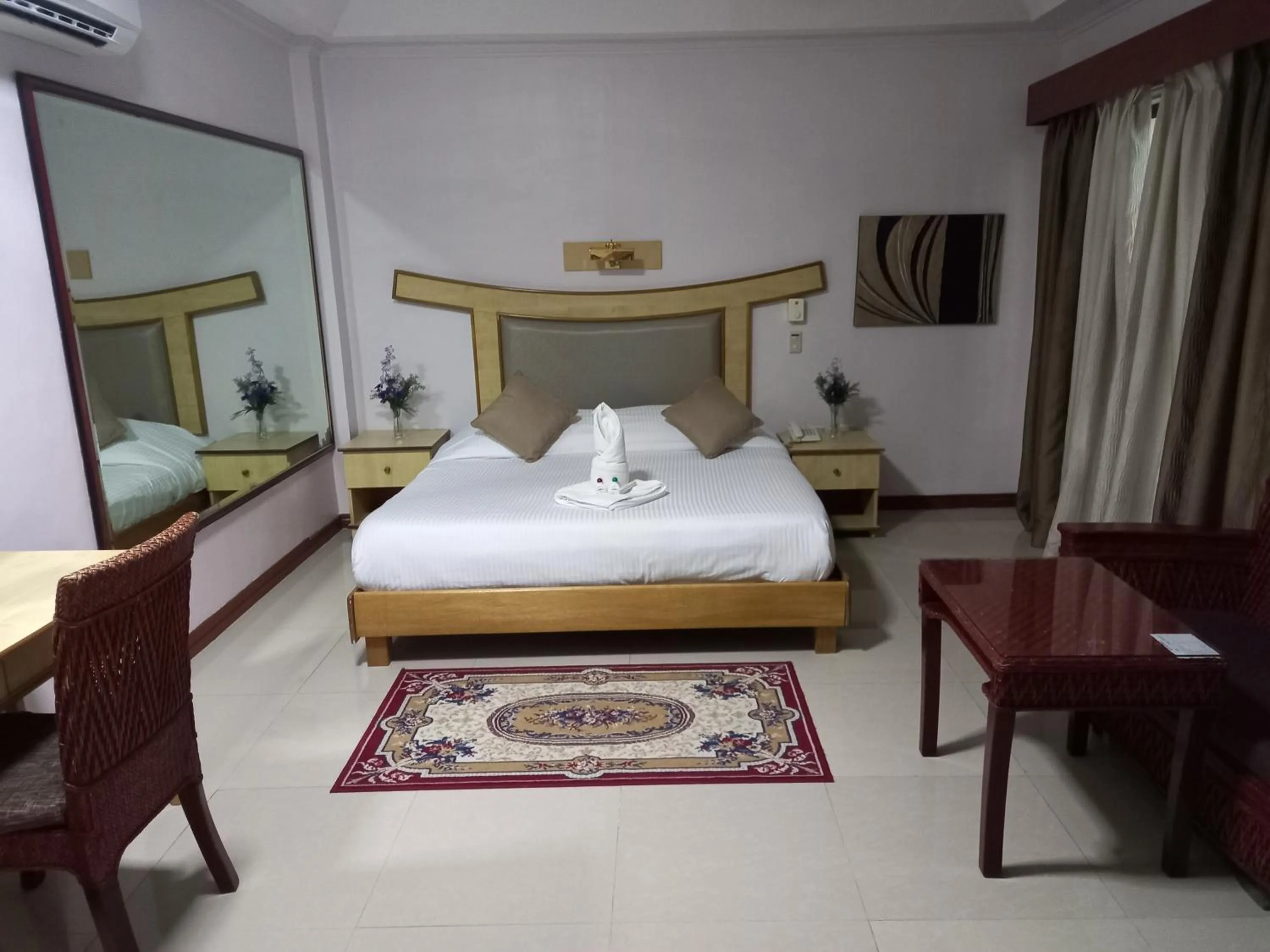 Bedroom, Bed in Wild Orchid Resort