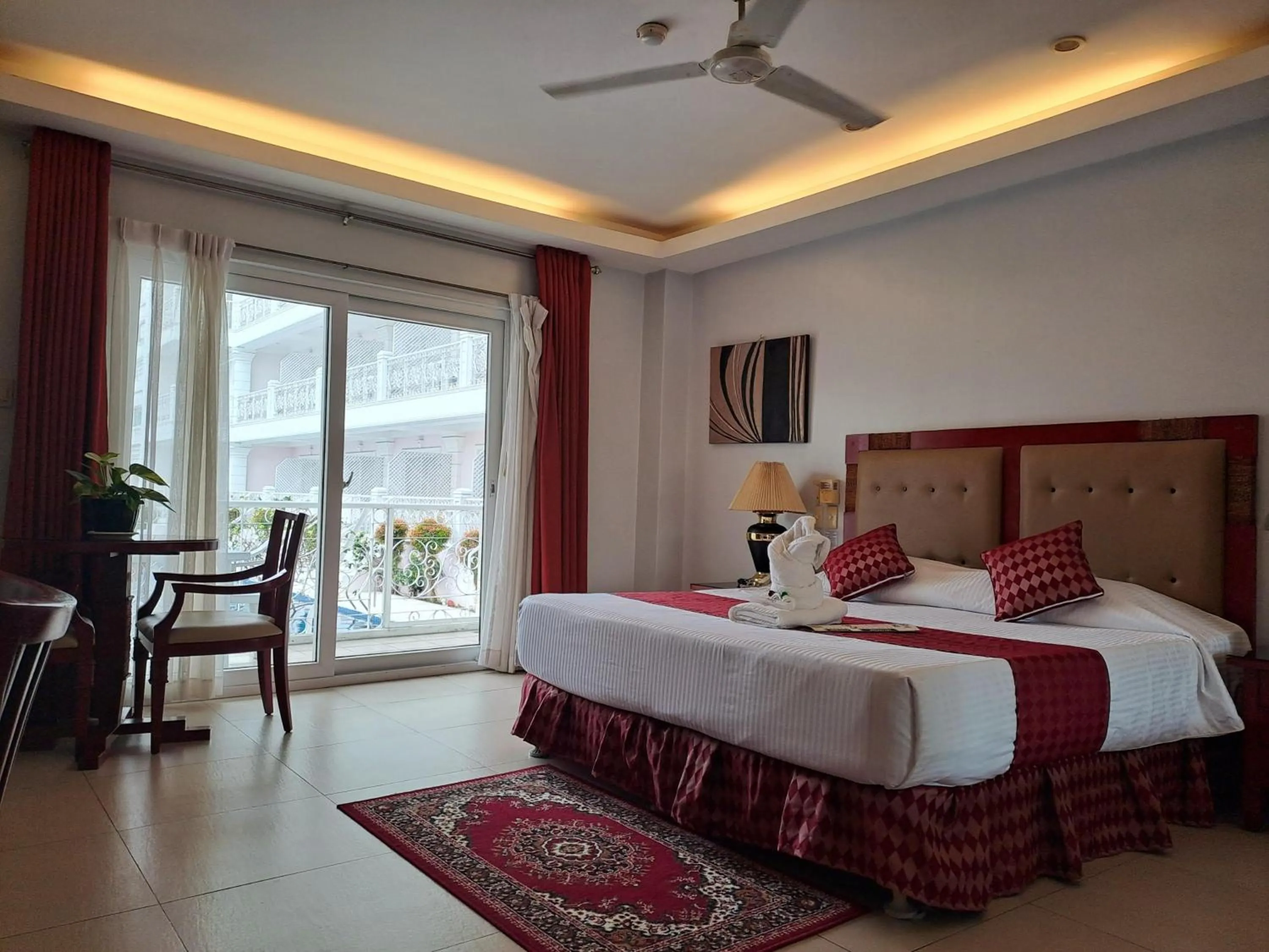 Photo of the whole room, Bed in Wild Orchid Resort