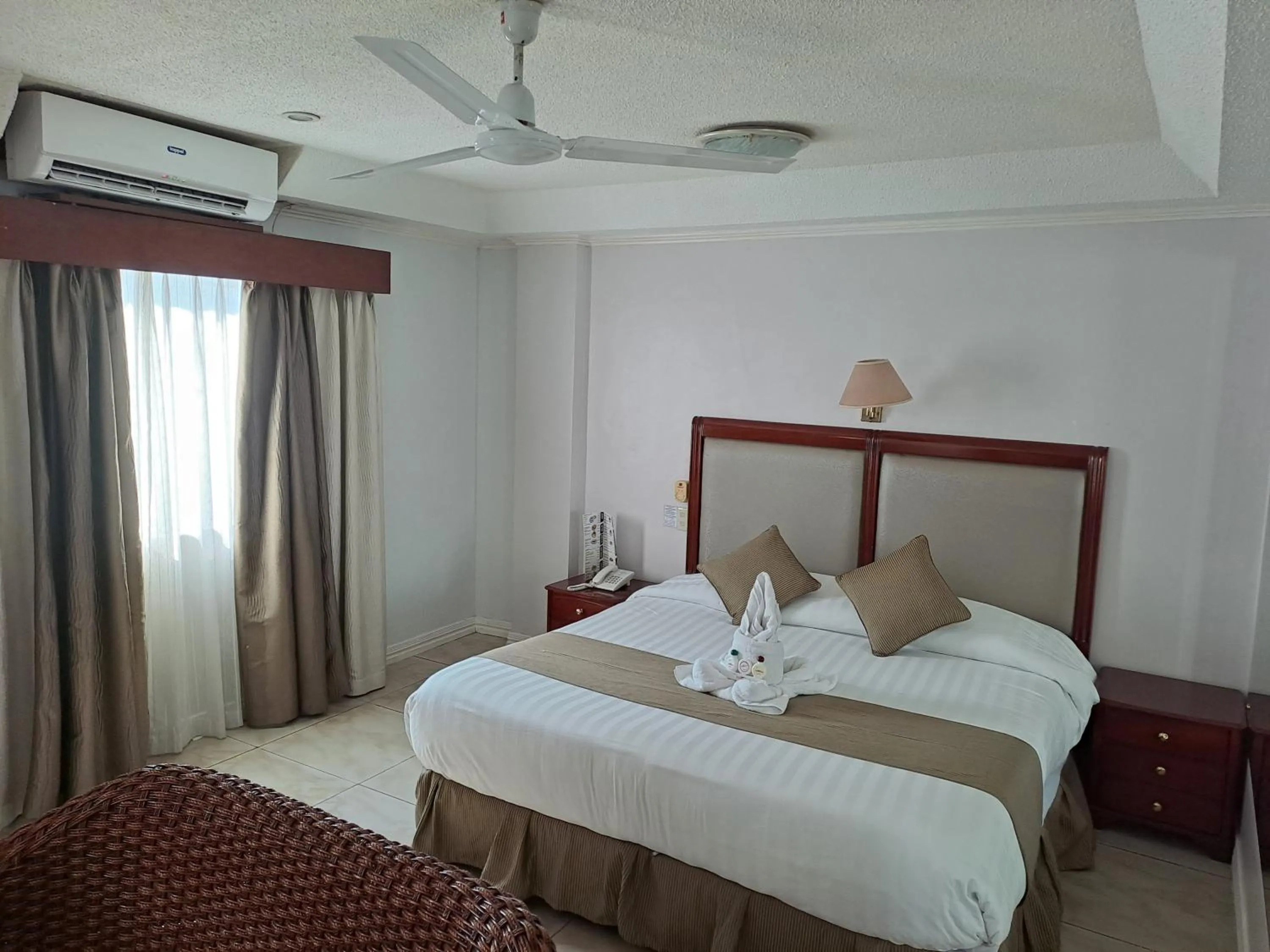 Photo of the whole room, Bed in Wild Orchid Resort