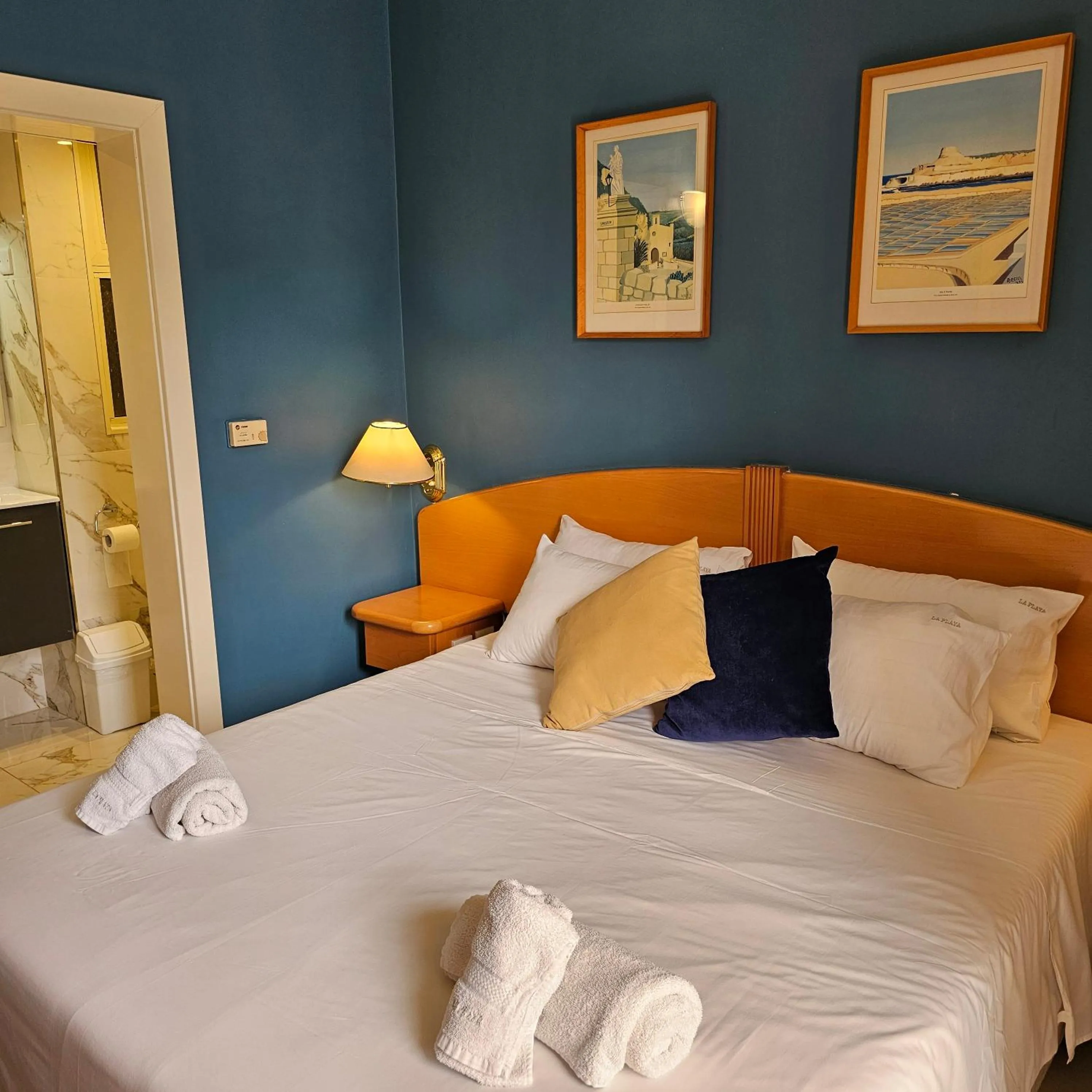 Bed in La Playa Hotel