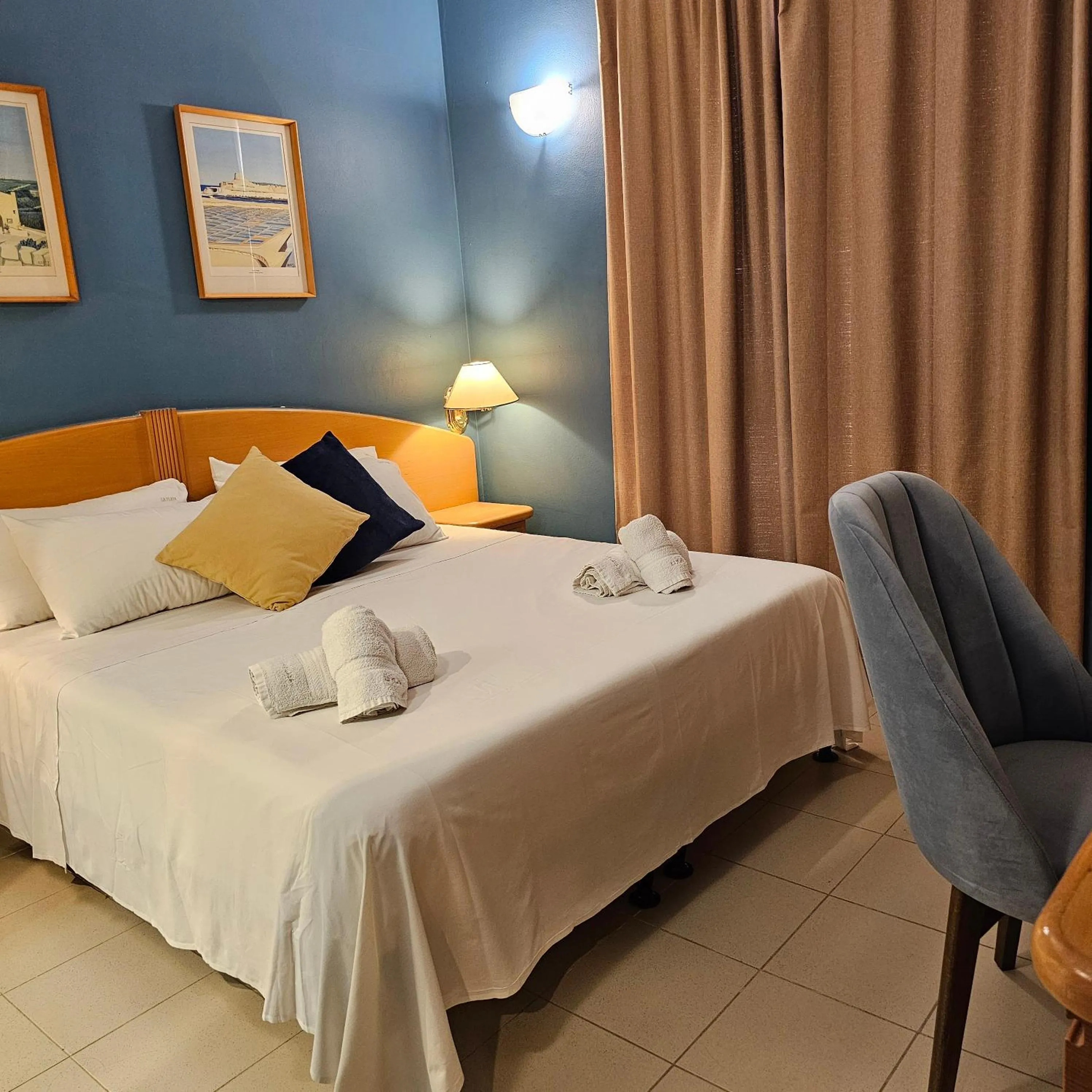 Bed in La Playa Hotel