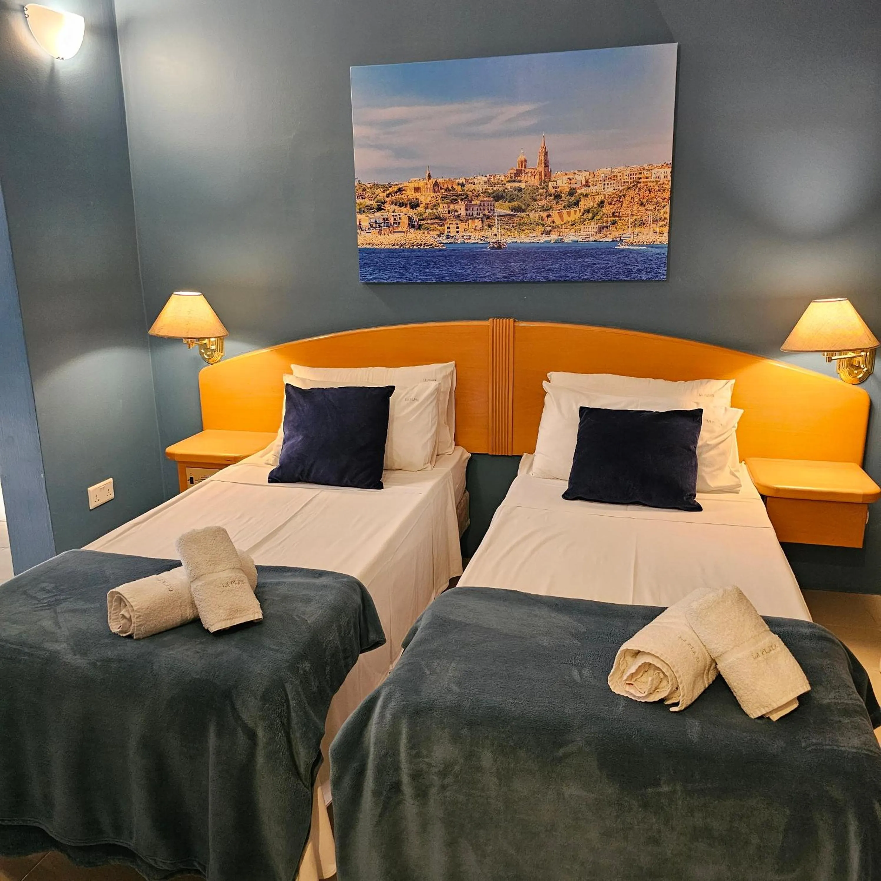 Bed in La Playa Hotel