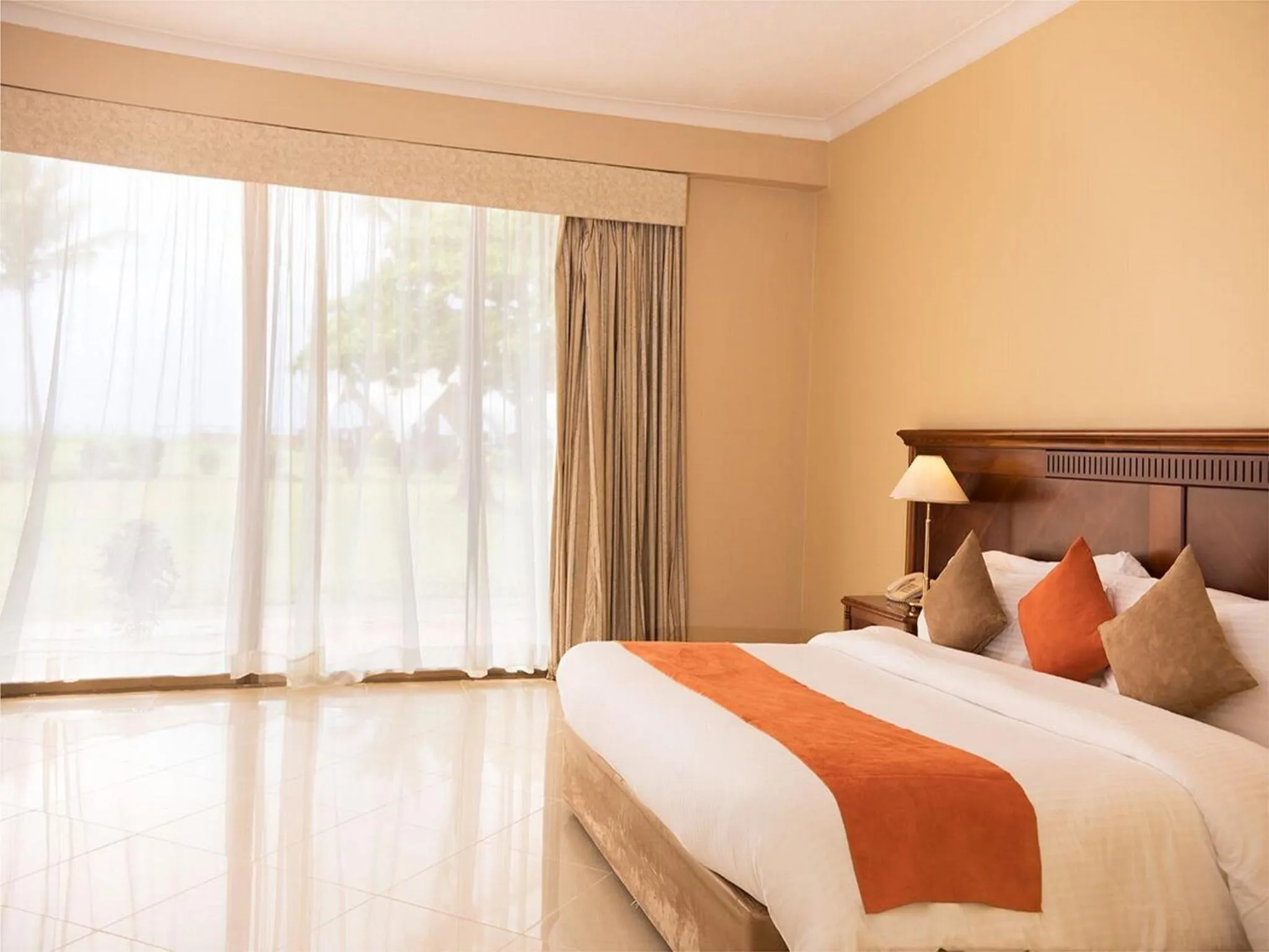 Bedroom in Golden Tulip Tanzania