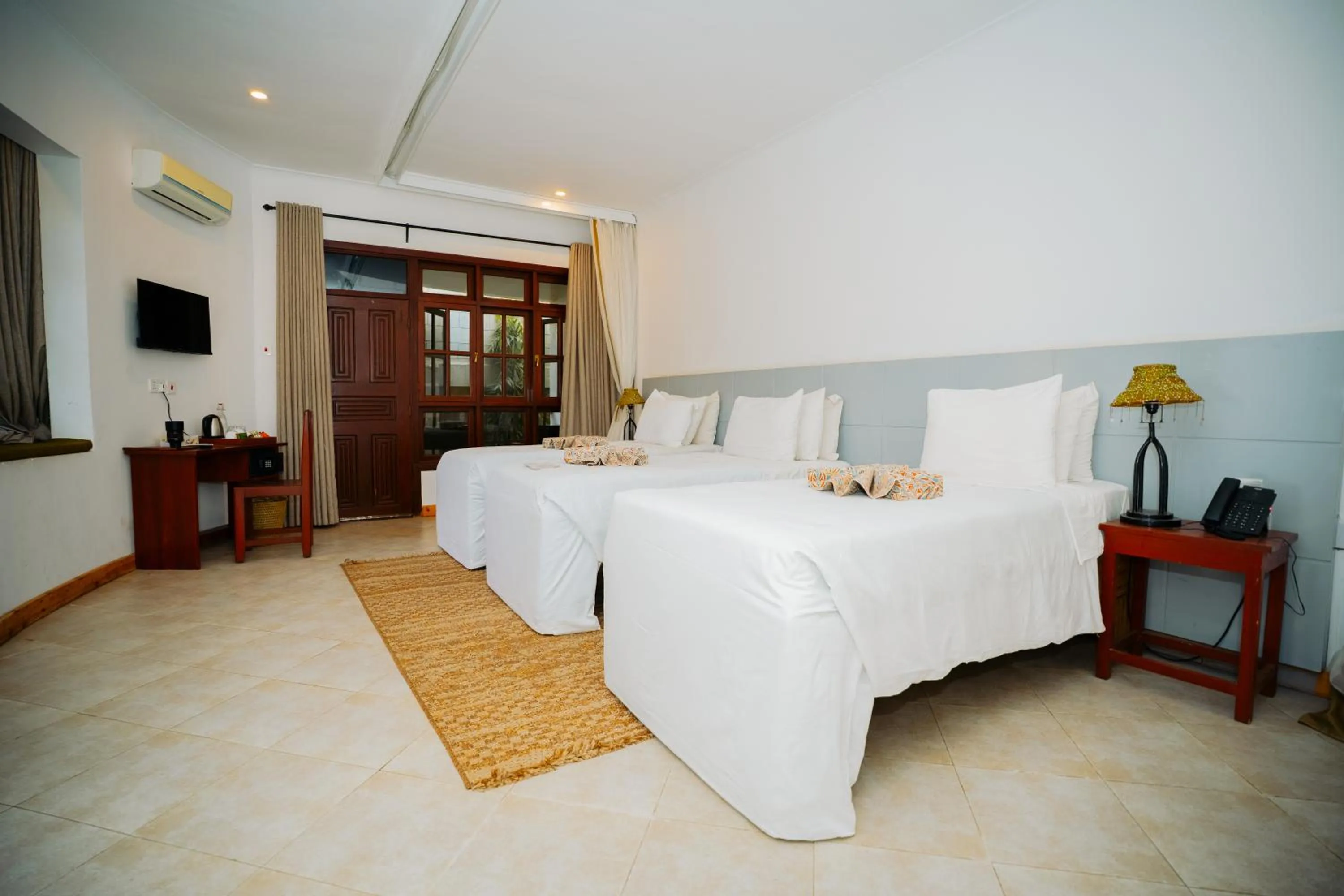 Bed in Arusha Planet Lodge